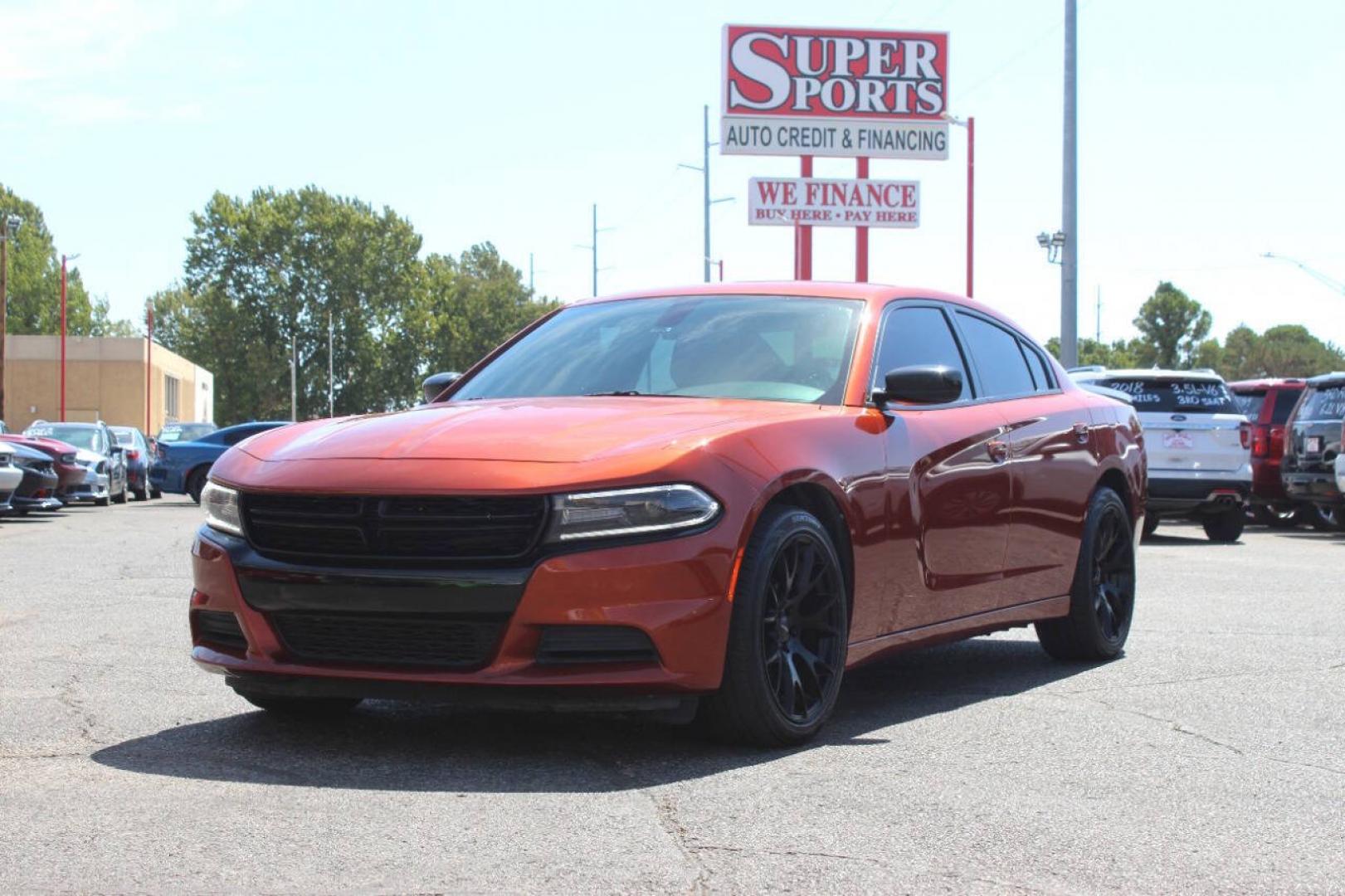 2021 Orange Dodge Charger SXT (2C3CDXBG6MH) with an Pentastar 3.6L V6 292hp 260ft. lbs. 3.6L V6 engine, Automatic 8-Speed transmission, located at 4301 NW 39th , Oklahoma City, OK, 73112, (405) 949-5600, 35.512135, -97.598671 - Hablamos espanol. SPEND SMART --- BUY FROM SUPER SPORTS. ALL PRICES, DOWN PAYMENTS, PAYMENTS, AND FINANCE TERMS ARE NEGOTIABLE AT THE TIME OF APPROVAL. WE WILL WORK WITH YOU TO FIT YOUR BUDGET. WE WILL EVEN LOWER AND ADJUST THE NUMBERS TO HELP MAKE THE VEHICLE MORE AFFORDABLE FOR YOU.- Photo#6