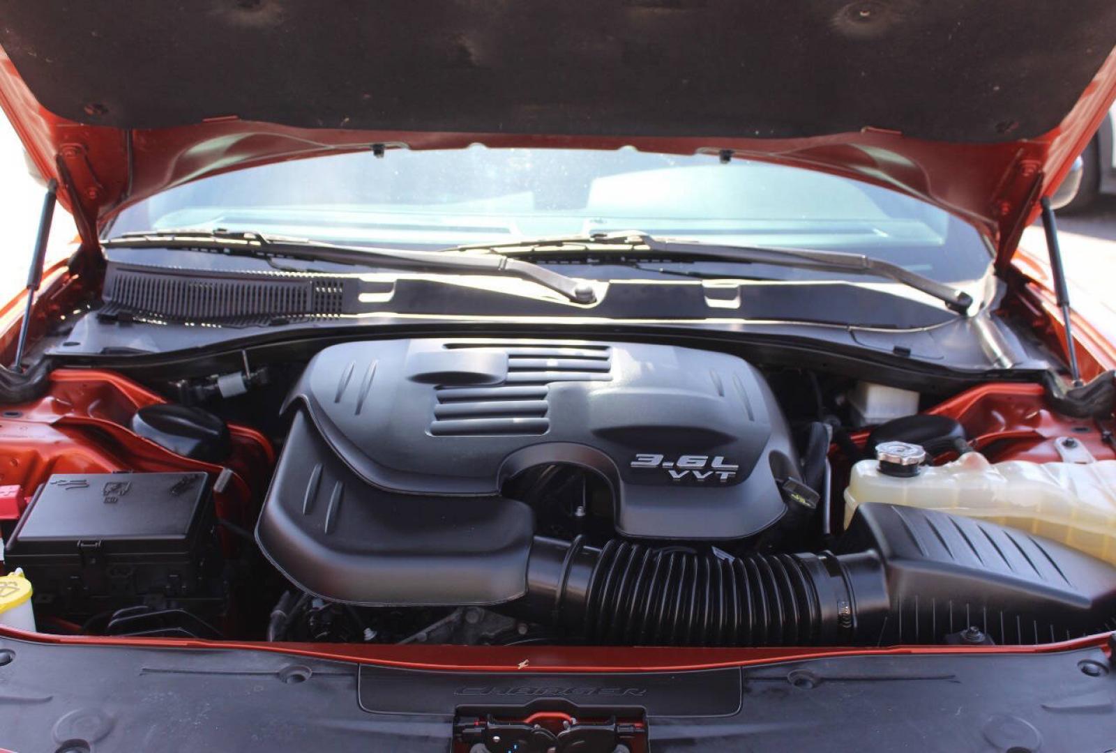 2021 Orange Dodge Charger SXT (2C3CDXBG6MH) with an Pentastar 3.6L V6 292hp 260ft. lbs. 3.6L V6 engine, Automatic 8-Speed transmission, located at 4301 NW 39th , Oklahoma City, OK, 73112, (405) 949-5600, 35.512135, -97.598671 - Hablamos espanol. SPEND SMART --- BUY FROM SUPER SPORTS. ALL PRICES, DOWN PAYMENTS, PAYMENTS, AND FINANCE TERMS ARE NEGOTIABLE AT THE TIME OF APPROVAL. WE WILL WORK WITH YOU TO FIT YOUR BUDGET. WE WILL EVEN LOWER AND ADJUST THE NUMBERS TO HELP MAKE THE VEHICLE MORE AFFORDABLE FOR YOU.- Photo#7