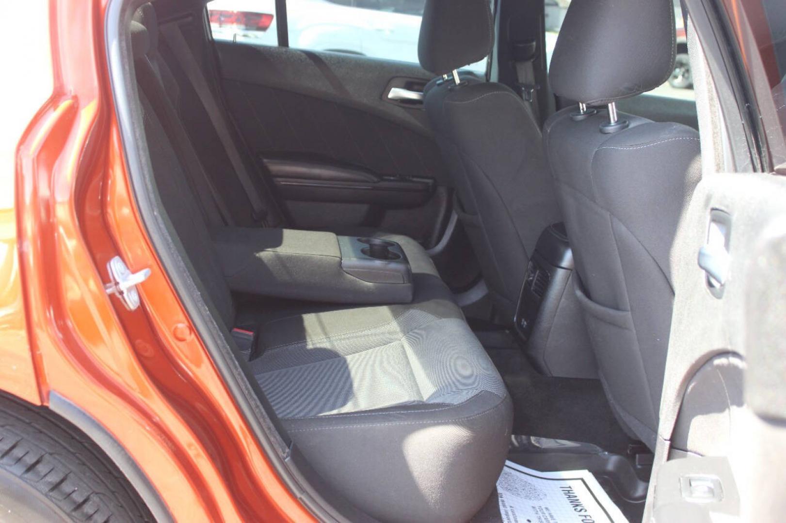 2021 Orange Dodge Charger SXT (2C3CDXBG6MH) with an Pentastar 3.6L V6 292hp 260ft. lbs. 3.6L V6 engine, Automatic 8-Speed transmission, located at 4301 NW 39th , Oklahoma City, OK, 73112, (405) 949-5600, 35.512135, -97.598671 - Hablamos espanol. SPEND SMART --- BUY FROM SUPER SPORTS. ALL PRICES, DOWN PAYMENTS, PAYMENTS, AND FINANCE TERMS ARE NEGOTIABLE AT THE TIME OF APPROVAL. WE WILL WORK WITH YOU TO FIT YOUR BUDGET. WE WILL EVEN LOWER AND ADJUST THE NUMBERS TO HELP MAKE THE VEHICLE MORE AFFORDABLE FOR YOU.- Photo#10