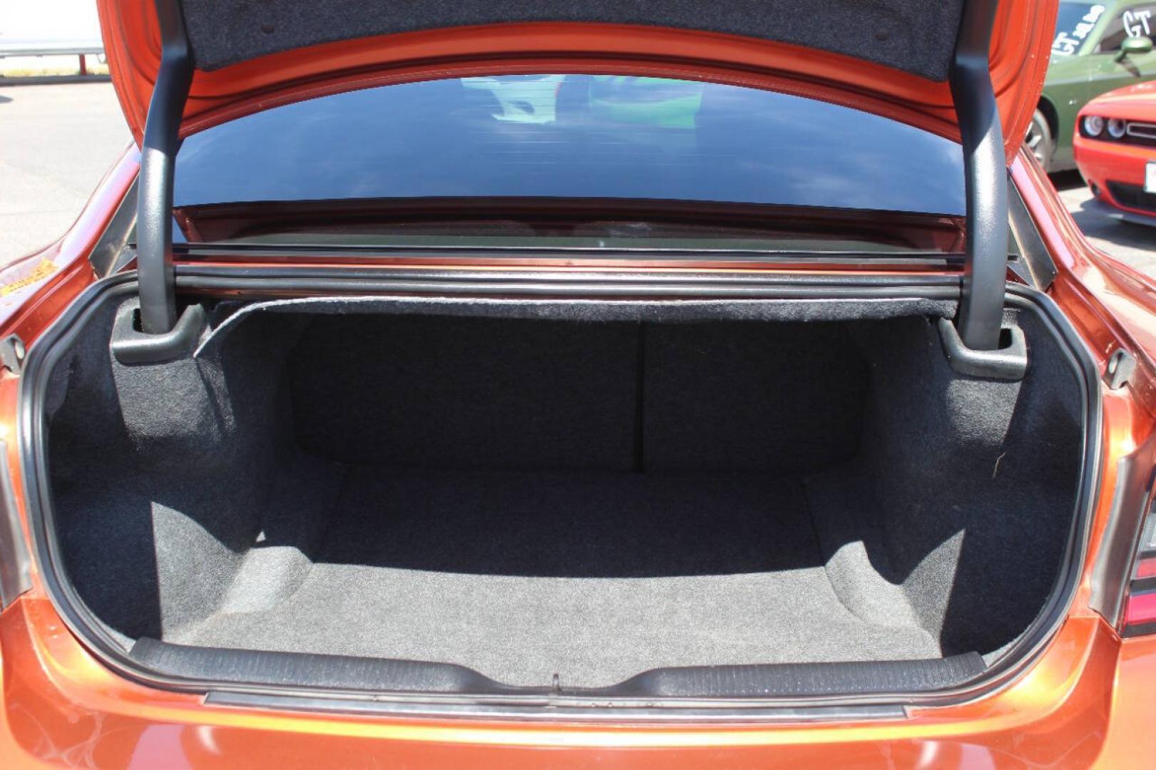 2021 Orange Dodge Charger SXT (2C3CDXBG6MH) with an Pentastar 3.6L V6 292hp 260ft. lbs. 3.6L V6 engine, Automatic 8-Speed transmission, located at 4301 NW 39th , Oklahoma City, OK, 73112, (405) 949-5600, 35.512135, -97.598671 - Hablamos espanol. SPEND SMART --- BUY FROM SUPER SPORTS. ALL PRICES, DOWN PAYMENTS, PAYMENTS, AND FINANCE TERMS ARE NEGOTIABLE AT THE TIME OF APPROVAL. WE WILL WORK WITH YOU TO FIT YOUR BUDGET. WE WILL EVEN LOWER AND ADJUST THE NUMBERS TO HELP MAKE THE VEHICLE MORE AFFORDABLE FOR YOU.- Photo#12