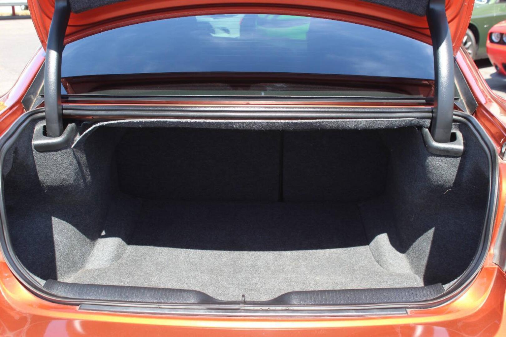 2021 Orange Dodge Charger SXT (2C3CDXBG6MH) with an Pentastar 3.6L V6 292hp 260ft. lbs. 3.6L V6 engine, Automatic 8-Speed transmission, located at 4301 NW 39th , Oklahoma City, OK, 73112, (405) 949-5600, 35.512135, -97.598671 - Hablamos espanol. SPEND SMART --- BUY FROM SUPER SPORTS. ALL PRICES, DOWN PAYMENTS, PAYMENTS, AND FINANCE TERMS ARE NEGOTIABLE AT THE TIME OF APPROVAL. WE WILL WORK WITH YOU TO FIT YOUR BUDGET. WE WILL EVEN LOWER AND ADJUST THE NUMBERS TO HELP MAKE THE VEHICLE MORE AFFORDABLE FOR YOU.- Photo#13