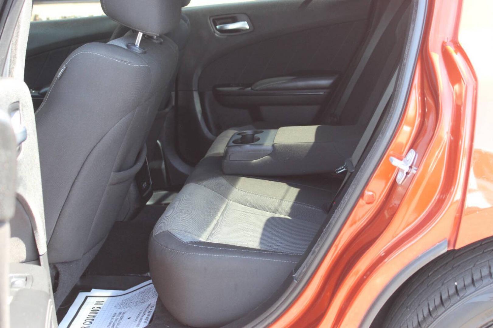 2021 Orange Dodge Charger SXT (2C3CDXBG6MH) with an Pentastar 3.6L V6 292hp 260ft. lbs. 3.6L V6 engine, Automatic 8-Speed transmission, located at 4301 NW 39th , Oklahoma City, OK, 73112, (405) 949-5600, 35.512135, -97.598671 - Hablamos espanol. SPEND SMART --- BUY FROM SUPER SPORTS. ALL PRICES, DOWN PAYMENTS, PAYMENTS, AND FINANCE TERMS ARE NEGOTIABLE AT THE TIME OF APPROVAL. WE WILL WORK WITH YOU TO FIT YOUR BUDGET. WE WILL EVEN LOWER AND ADJUST THE NUMBERS TO HELP MAKE THE VEHICLE MORE AFFORDABLE FOR YOU.- Photo#14