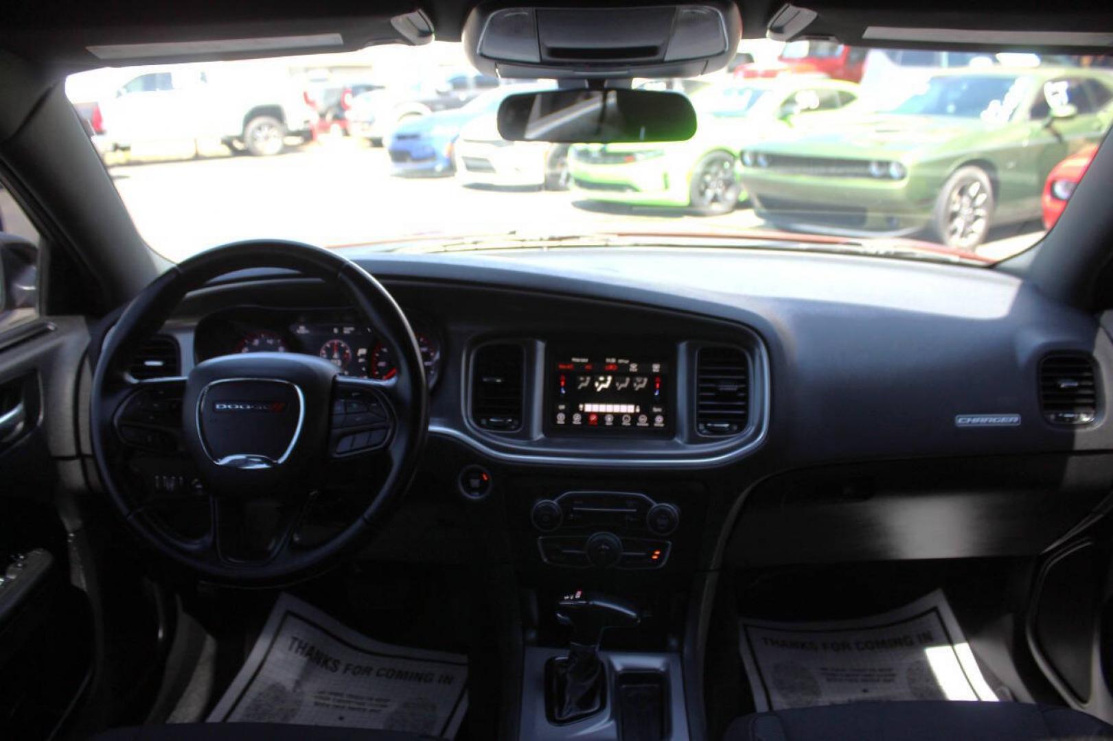 2021 Orange Dodge Charger SXT (2C3CDXBG6MH) with an Pentastar 3.6L V6 292hp 260ft. lbs. 3.6L V6 engine, Automatic 8-Speed transmission, located at 4301 NW 39th , Oklahoma City, OK, 73112, (405) 949-5600, 35.512135, -97.598671 - Hablamos espanol. SPEND SMART --- BUY FROM SUPER SPORTS. ALL PRICES, DOWN PAYMENTS, PAYMENTS, AND FINANCE TERMS ARE NEGOTIABLE AT THE TIME OF APPROVAL. WE WILL WORK WITH YOU TO FIT YOUR BUDGET. WE WILL EVEN LOWER AND ADJUST THE NUMBERS TO HELP MAKE THE VEHICLE MORE AFFORDABLE FOR YOU.- Photo#19