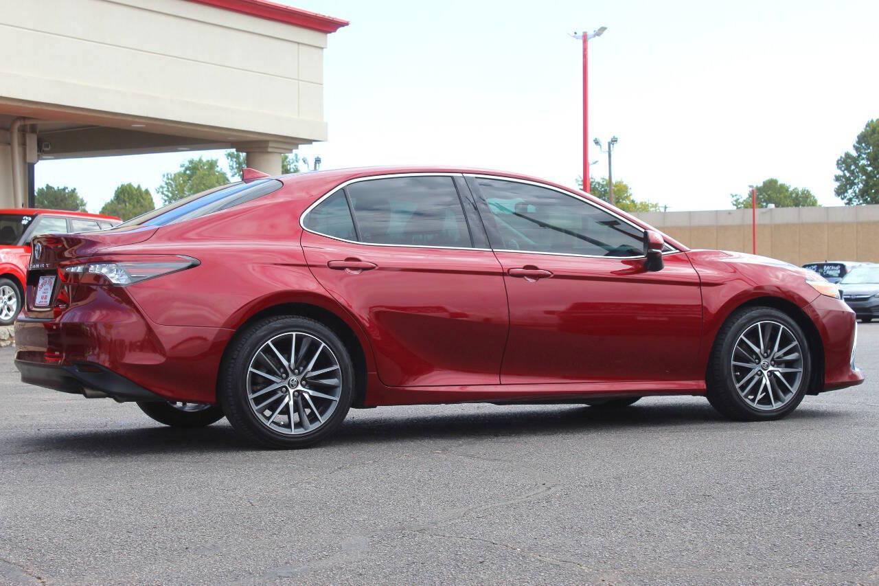 2021 Maroon Toyota Camry XLE (4T1F11AK3MU) with an 2.5L I4 203hp 184ft. lbs. 2.5L I4 engine, Automatic 8-Speed transmission, located at 4301 NW 39th , Oklahoma City, OK, 73112, (405) 949-5600, 35.512135, -97.598671 - Hablamos espanol. SPEND SMART --- BUY FROM SUPER SPORTS. ALL PRICES, DOWN PAYMENTS, PAYMENTS, AND FINANCE TERMS ARE NEGOTIABLE AT THE TIME OF APPROVAL. WE WILL WORK WITH YOU TO FIT YOUR BUDGET. WE WILL EVEN LOWER AND ADJUST THE NUMBERS TO HELP MAKE THE VE HICLE MORE AFFORDABLE FOR YOU.- Photo#2