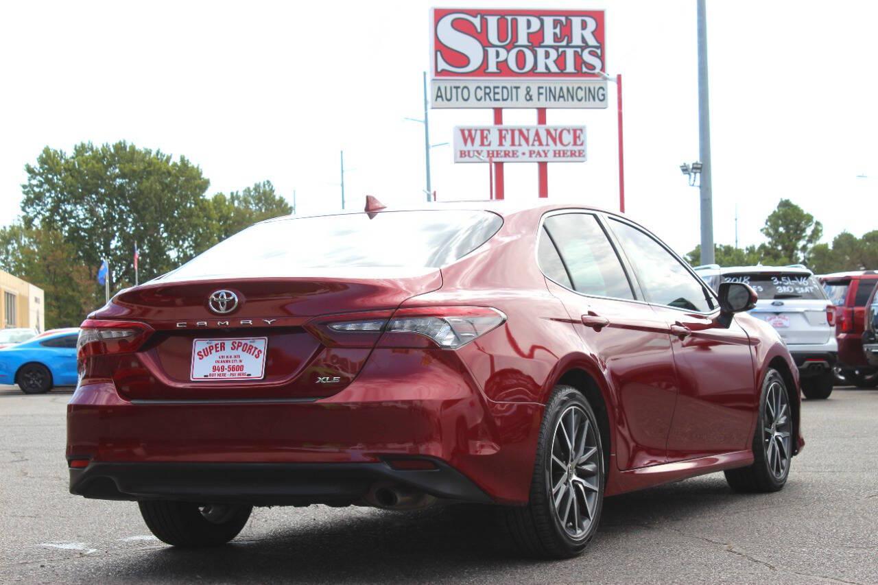 2021 Maroon Toyota Camry XLE (4T1F11AK3MU) with an 2.5L I4 203hp 184ft. lbs. 2.5L I4 engine, Automatic 8-Speed transmission, located at 4301 NW 39th , Oklahoma City, OK, 73112, (405) 949-5600, 35.512135, -97.598671 - Hablamos espanol. SPEND SMART --- BUY FROM SUPER SPORTS. ALL PRICES, DOWN PAYMENTS, PAYMENTS, AND FINANCE TERMS ARE NEGOTIABLE AT THE TIME OF APPROVAL. WE WILL WORK WITH YOU TO FIT YOUR BUDGET. WE WILL EVEN LOWER AND ADJUST THE NUMBERS TO HELP MAKE THE VE HICLE MORE AFFORDABLE FOR YOU.- Photo#3