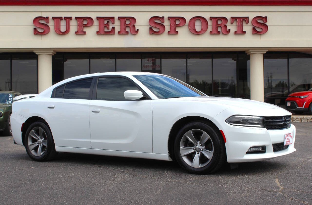 2016 White Dodge Charger SXT (2C3CDXHG4GH) with an Pentastar 3.6L V6 292hp 260ft. lbs. 3.6L V6 engine, Automatic 8-Speed transmission, located at 4301 NW 39th , Oklahoma City, OK, 73112, (405) 949-5600, 35.512135, -97.598671 - Hablamos espanol. SPEND SMART --- BUY FROM SUPER SPORTS. ALL PRICES, DOWN PAYMENTS, PAYMENTS, AND FINANCE TERMS ARE NEGOTIABLE AT THE TIME OF APPROVAL. WE WILL WORK WITH YOU TO FIT YOUR BUDGET. WE WILL EVEN LOWER AND ADJUST THE NUMBERS TO HELP MAKE THE VE HICLE MORE AFFORDABLE FOR YOU.- Photo#0