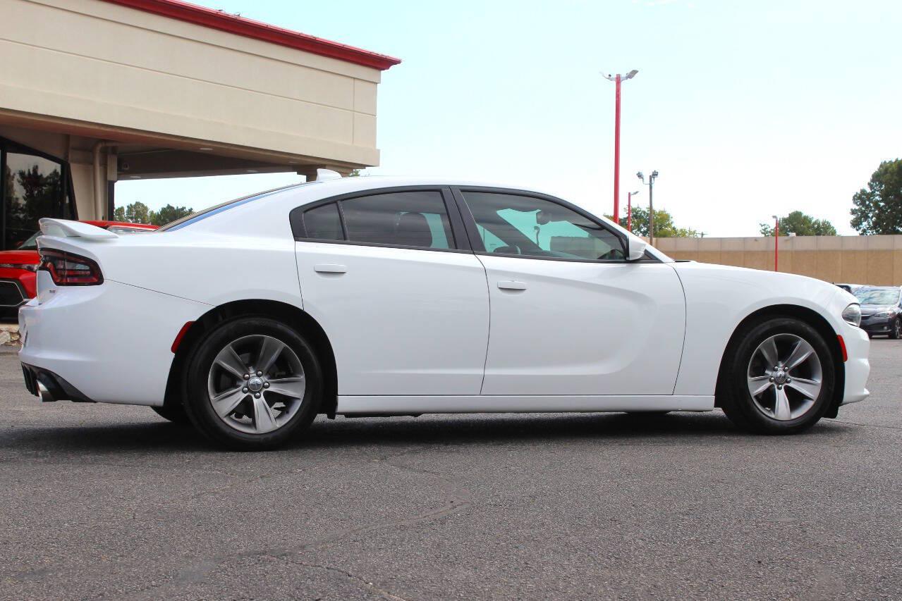 2016 White Dodge Charger SXT (2C3CDXHG4GH) with an Pentastar 3.6L V6 292hp 260ft. lbs. 3.6L V6 engine, Automatic 8-Speed transmission, located at 4301 NW 39th , Oklahoma City, OK, 73112, (405) 949-5600, 35.512135, -97.598671 - Hablamos espanol. SPEND SMART --- BUY FROM SUPER SPORTS. ALL PRICES, DOWN PAYMENTS, PAYMENTS, AND FINANCE TERMS ARE NEGOTIABLE AT THE TIME OF APPROVAL. WE WILL WORK WITH YOU TO FIT YOUR BUDGET. WE WILL EVEN LOWER AND ADJUST THE NUMBERS TO HELP MAKE THE VE HICLE MORE AFFORDABLE FOR YOU.- Photo#2