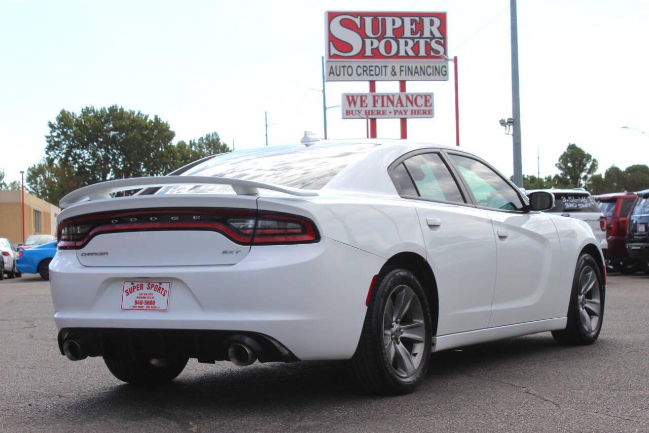 2016 White Dodge Charger SXT (2C3CDXHG4GH) with an Pentastar 3.6L V6 292hp 260ft. lbs. 3.6L V6 engine, Automatic 8-Speed transmission, located at 4301 NW 39th , Oklahoma City, OK, 73112, (405) 949-5600, 35.512135, -97.598671 - Hablamos espanol. SPEND SMART --- BUY FROM SUPER SPORTS. ALL PRICES, DOWN PAYMENTS, PAYMENTS, AND FINANCE TERMS ARE NEGOTIABLE AT THE TIME OF APPROVAL. WE WILL WORK WITH YOU TO FIT YOUR BUDGET. WE WILL EVEN LOWER AND ADJUST THE NUMBERS TO HELP MAKE THE VE HICLE MORE AFFORDABLE FOR YOU.- Photo#3