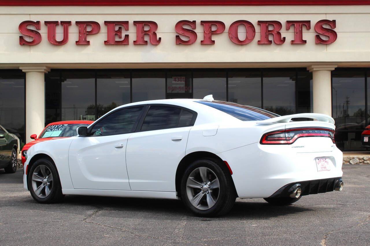 2016 White Dodge Charger SXT (2C3CDXHG4GH) with an Pentastar 3.6L V6 292hp 260ft. lbs. 3.6L V6 engine, Automatic 8-Speed transmission, located at 4301 NW 39th , Oklahoma City, OK, 73112, (405) 949-5600, 35.512135, -97.598671 - Hablamos espanol. SPEND SMART --- BUY FROM SUPER SPORTS. ALL PRICES, DOWN PAYMENTS, PAYMENTS, AND FINANCE TERMS ARE NEGOTIABLE AT THE TIME OF APPROVAL. WE WILL WORK WITH YOU TO FIT YOUR BUDGET. WE WILL EVEN LOWER AND ADJUST THE NUMBERS TO HELP MAKE THE VE HICLE MORE AFFORDABLE FOR YOU.- Photo#4