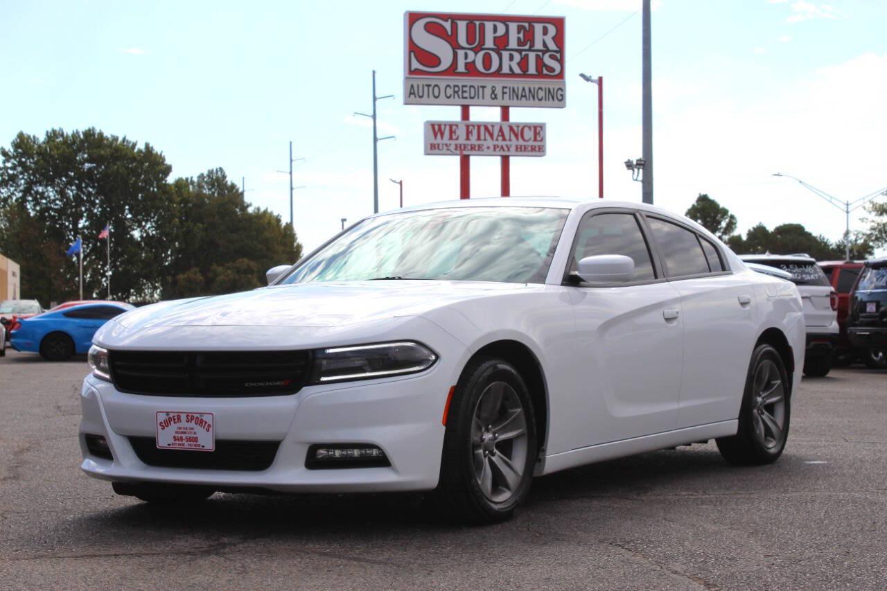 2016 White Dodge Charger SXT (2C3CDXHG4GH) with an Pentastar 3.6L V6 292hp 260ft. lbs. 3.6L V6 engine, Automatic 8-Speed transmission, located at 4301 NW 39th , Oklahoma City, OK, 73112, (405) 949-5600, 35.512135, -97.598671 - Hablamos espanol. SPEND SMART --- BUY FROM SUPER SPORTS. ALL PRICES, DOWN PAYMENTS, PAYMENTS, AND FINANCE TERMS ARE NEGOTIABLE AT THE TIME OF APPROVAL. WE WILL WORK WITH YOU TO FIT YOUR BUDGET. WE WILL EVEN LOWER AND ADJUST THE NUMBERS TO HELP MAKE THE VE HICLE MORE AFFORDABLE FOR YOU.- Photo#6