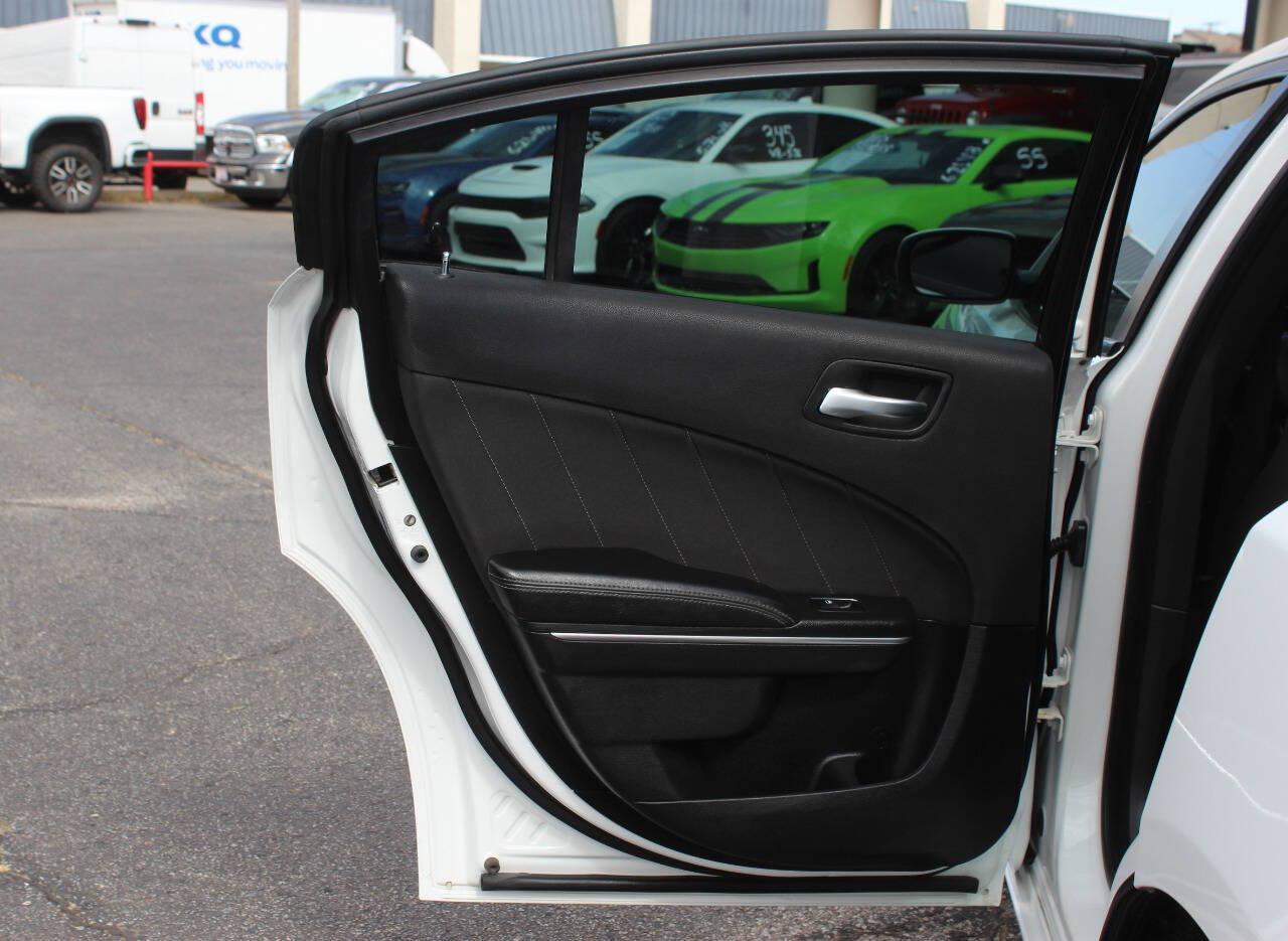 2016 White Dodge Charger SXT (2C3CDXHG4GH) with an Pentastar 3.6L V6 292hp 260ft. lbs. 3.6L V6 engine, Automatic 8-Speed transmission, located at 4301 NW 39th , Oklahoma City, OK, 73112, (405) 949-5600, 35.512135, -97.598671 - Hablamos espanol. SPEND SMART --- BUY FROM SUPER SPORTS. ALL PRICES, DOWN PAYMENTS, PAYMENTS, AND FINANCE TERMS ARE NEGOTIABLE AT THE TIME OF APPROVAL. WE WILL WORK WITH YOU TO FIT YOUR BUDGET. WE WILL EVEN LOWER AND ADJUST THE NUMBERS TO HELP MAKE THE VE HICLE MORE AFFORDABLE FOR YOU.- Photo#13