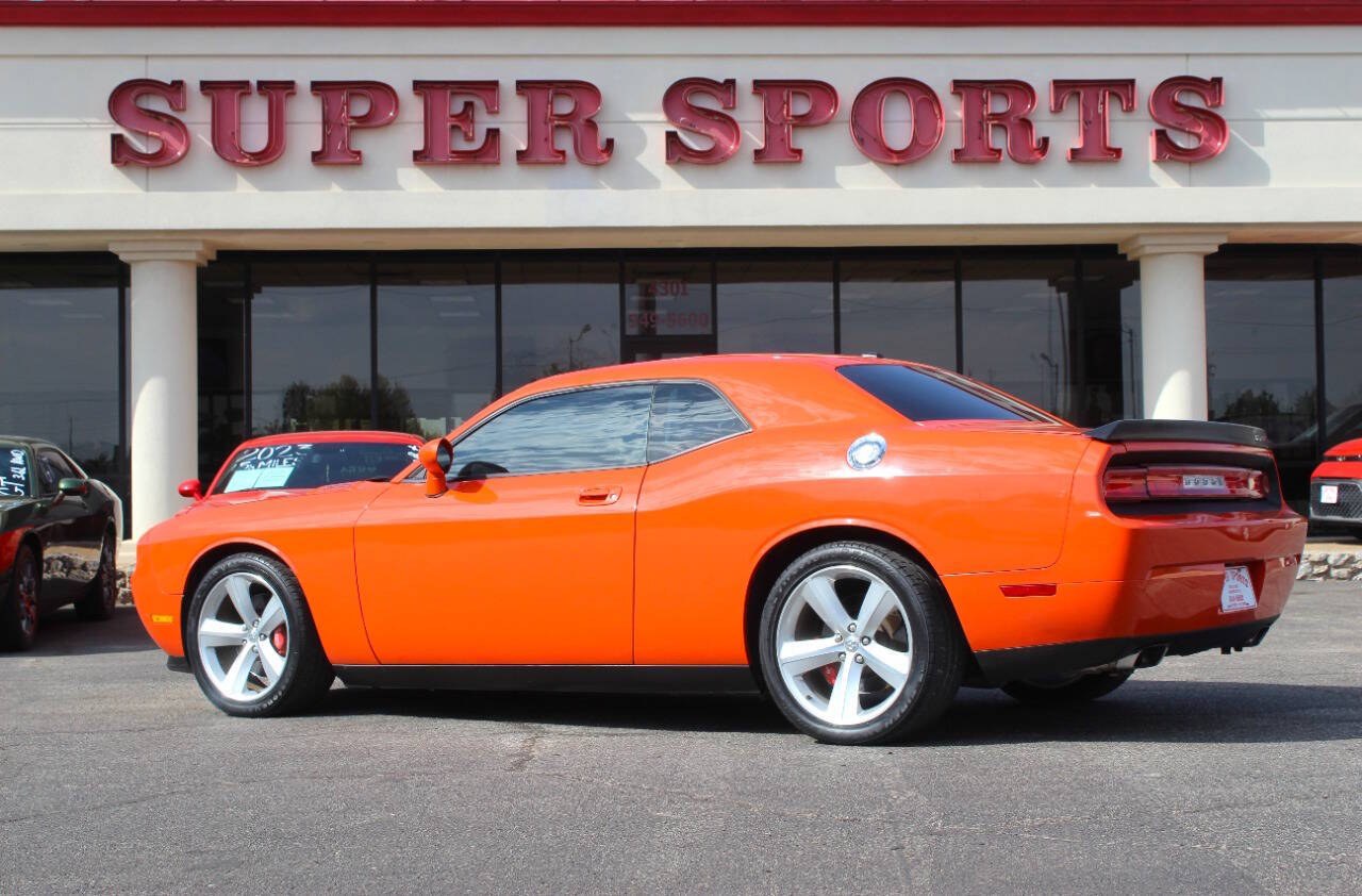2009 Red Dodge Challenger SRT8 (2B3LJ74W49H) with an 6.1L V8 6.1L V8 engine, Automatic 5-Speed transmission, located at 4301 NW 39th , Oklahoma City, OK, 73112, (405) 949-5600, 35.512135, -97.598671 - Hablamos espanol. SPEND SMART --- BUY FROM SUPER SPORTS. ALL PRICES, DOWN PAYMENTS, PAYMENTS, AND FINANCE TERMS ARE NEGOTIABLE AT THE TIME OF APPROVAL. WE WILL WORK WITH YOU TO FIT YOUR BUDGET. WE WILL EVEN LOWER AND ADJUST THE NUMBERS TO HELP MAKE THE VEHICLE MORE AFFORDABLE FOR YOU.- Photo#4