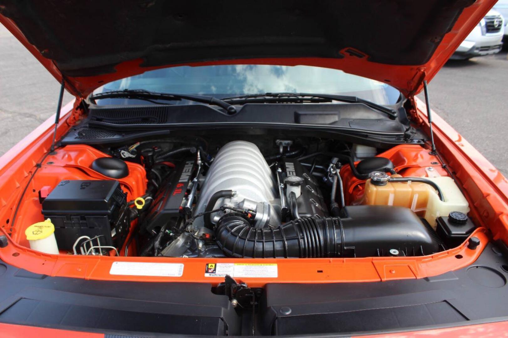 2009 Red Dodge Challenger SRT8 (2B3LJ74W49H) with an 6.1L V8 6.1L V8 engine, Automatic 5-Speed transmission, located at 4301 NW 39th , Oklahoma City, OK, 73112, (405) 949-5600, 35.512135, -97.598671- Photo#7
