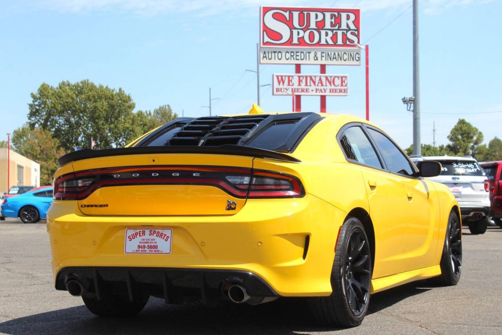 2017 Yellow Dodge Charger SRT 392 (2C3CDXGJ1HH) with an HEMI 6.4L V8 485hp 475ft. lbs. 6.4L V8 engine, Automatic 8-Speed transmission, located at 4301 NW 39th , Oklahoma City, OK, 73112, (405) 949-5600, 35.512135, -97.598671- Photo#3