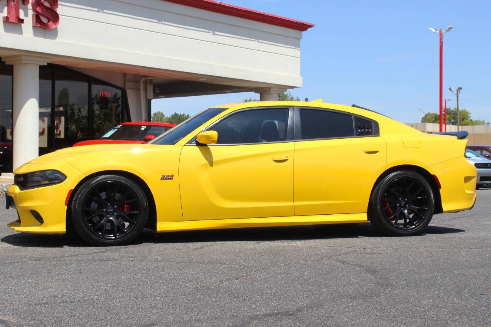 2017 Yellow Dodge Charger SRT 392 (2C3CDXGJ1HH) with an HEMI 6.4L V8 485hp 475ft. lbs. 6.4L V8 engine, Automatic 8-Speed transmission, located at 4301 NW 39th , Oklahoma City, OK, 73112, (405) 949-5600, 35.512135, -97.598671- Photo#5