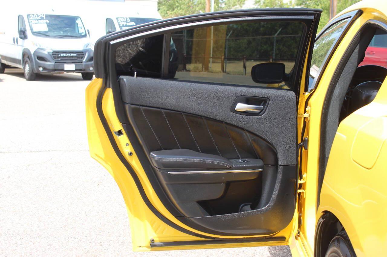 2017 Yellow Dodge Charger SRT 392 (2C3CDXGJ1HH) with an HEMI 6.4L V8 485hp 475ft. lbs. 6.4L V8 engine, Automatic 8-Speed transmission, located at 4301 NW 39th , Oklahoma City, OK, 73112, (405) 949-5600, 35.512135, -97.598671 - Hablamos espanol. SPEND SMART --- BUY FROM SUPER SPORTS. ALL PRICES, DOWN PAYMENTS, PAYMENTS, AND FINANCE TERMS ARE NEGOTIABLE AT THE TIME OF APPROVAL. WE WILL WORK WITH YOU TO FIT YOUR BUDGET. WE WILL EVEN LOWER AND ADJUST THE NUMBERS TO HELP MAKE THE VEHICLE MORE AFFORDABLE FOR YOU.- Photo#16