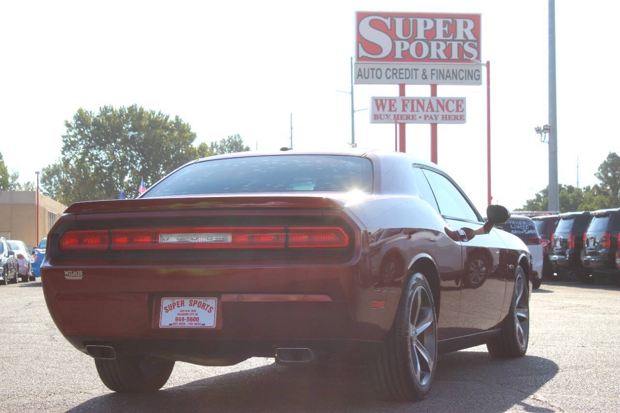 2014 Burgundy Dodge Challenger SXT (2C3CDYAG0EH) with an Pentastar 3.6L V6 305hp 268ft. lbs. 3.6L V6 engine, Automatic 5-Speed transmission, located at 4301 NW 39th , Oklahoma City, OK, 73112, (405) 949-5600, 35.512135, -97.598671 - Hablamos espanol. SPEND SMART --- BUY FROM SUPER SPORTS. ALL PRICES, DOWN PAYMENTS, PAYMENTS, AND FINANCE TERMS ARE NEGOTIABLE AT THE TIME OF APPROVAL. WE WILL WORK WITH YOU TO FIT YOUR BUDGET. WE WILL EVEN LOWER AND ADJUST THE NUMBERS TO HELP MAKE THE VEHICLE MORE AFFORDABLE FOR YOU.- Photo#2