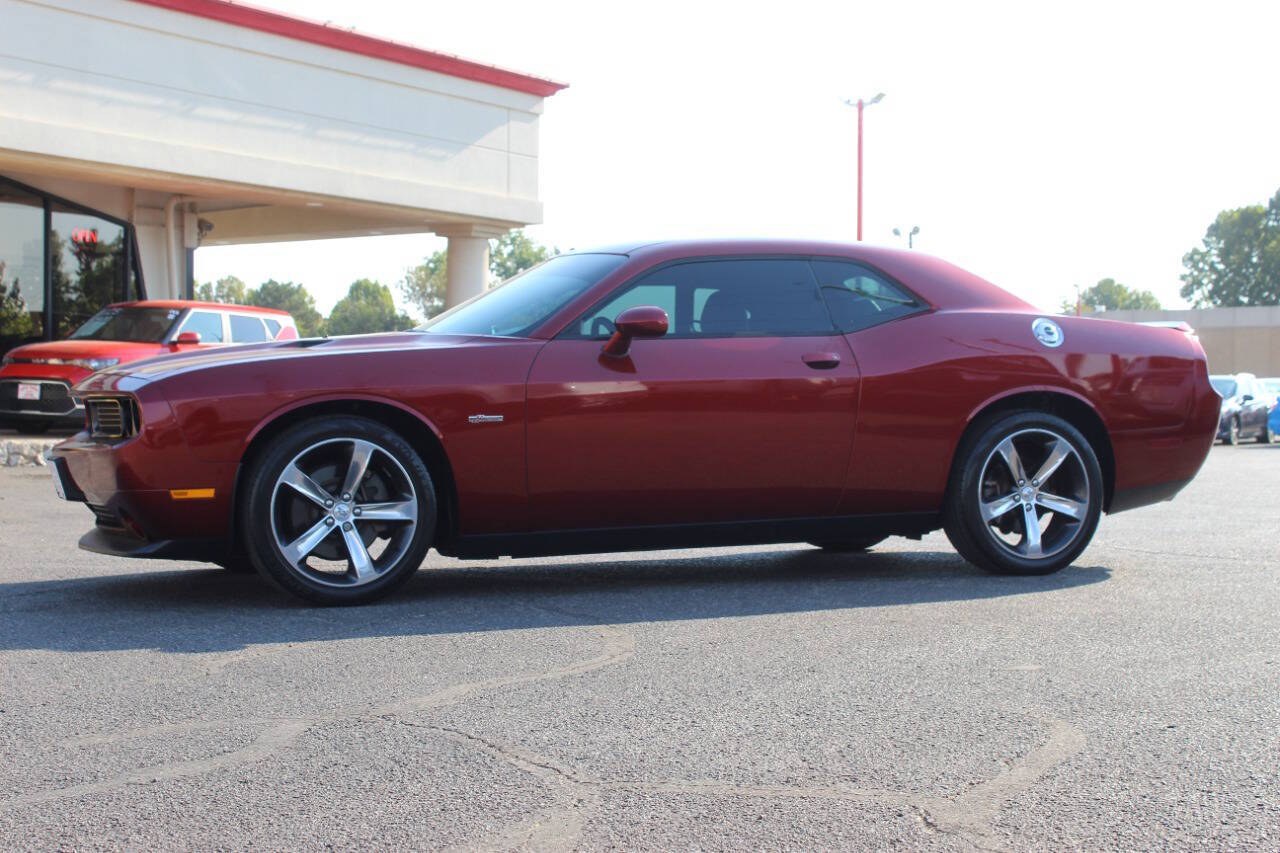 2014 Burgundy Dodge Challenger SXT (2C3CDYAG0EH) with an Pentastar 3.6L V6 305hp 268ft. lbs. 3.6L V6 engine, Automatic 5-Speed transmission, located at 4301 NW 39th , Oklahoma City, OK, 73112, (405) 949-5600, 35.512135, -97.598671 - Hablamos espanol. SPEND SMART --- BUY FROM SUPER SPORTS. ALL PRICES, DOWN PAYMENTS, PAYMENTS, AND FINANCE TERMS ARE NEGOTIABLE AT THE TIME OF APPROVAL. WE WILL WORK WITH YOU TO FIT YOUR BUDGET. WE WILL EVEN LOWER AND ADJUST THE NUMBERS TO HELP MAKE THE VEHICLE MORE AFFORDABLE FOR YOU.- Photo#4