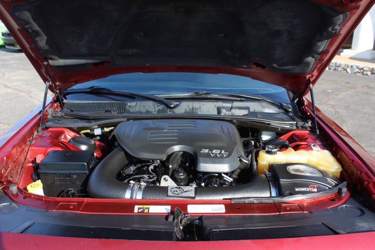 2014 Burgundy Dodge Challenger SXT (2C3CDYAG0EH) with an Pentastar 3.6L V6 305hp 268ft. lbs. 3.6L V6 engine, Automatic 5-Speed transmission, located at 4301 NW 39th , Oklahoma City, OK, 73112, (405) 949-5600, 35.512135, -97.598671 - Hablamos espanol. SPEND SMART --- BUY FROM SUPER SPORTS. ALL PRICES, DOWN PAYMENTS, PAYMENTS, AND FINANCE TERMS ARE NEGOTIABLE AT THE TIME OF APPROVAL. WE WILL WORK WITH YOU TO FIT YOUR BUDGET. WE WILL EVEN LOWER AND ADJUST THE NUMBERS TO HELP MAKE THE VEHICLE MORE AFFORDABLE FOR YOU.- Photo#6