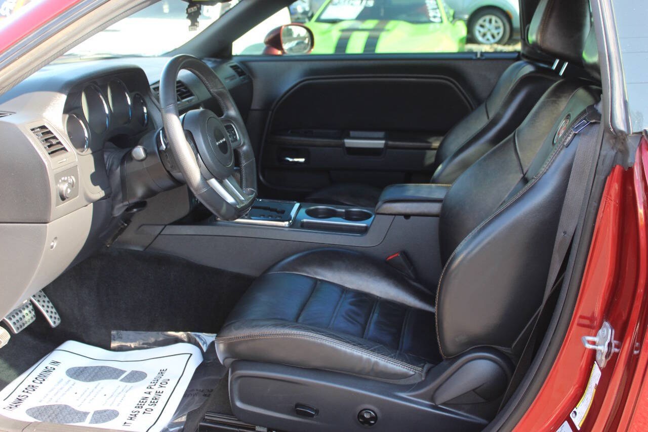 2014 Burgundy Dodge Challenger SXT (2C3CDYAG0EH) with an Pentastar 3.6L V6 305hp 268ft. lbs. 3.6L V6 engine, Automatic 5-Speed transmission, located at 4301 NW 39th , Oklahoma City, OK, 73112, (405) 949-5600, 35.512135, -97.598671 - Hablamos espanol. SPEND SMART --- BUY FROM SUPER SPORTS. ALL PRICES, DOWN PAYMENTS, PAYMENTS, AND FINANCE TERMS ARE NEGOTIABLE AT THE TIME OF APPROVAL. WE WILL WORK WITH YOU TO FIT YOUR BUDGET. WE WILL EVEN LOWER AND ADJUST THE NUMBERS TO HELP MAKE THE VEHICLE MORE AFFORDABLE FOR YOU.- Photo#11