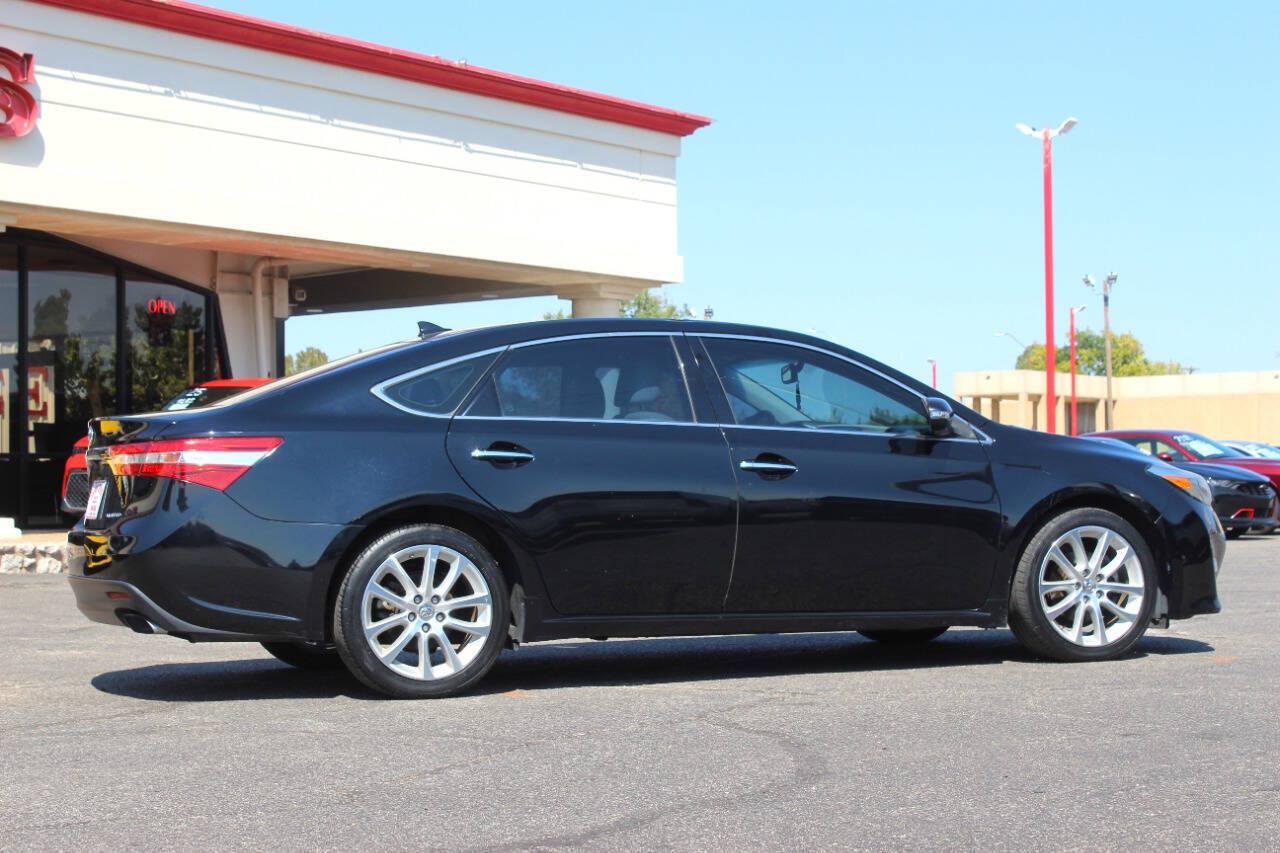 2013 Black Toyota Avalon XLE (4T1BK1EBXDU) with an 3.5L V6 268hp 248ft. lbs. 3.5L V6 engine, Automatic 6-Speed transmission, located at 4301 NW 39th , Oklahoma City, OK, 73112, (405) 949-5600, 35.512135, -97.598671 - Hablamos espanol. SPEND SMART --- BUY FROM SUPER SPORTS. ALL PRICES, DOWN PAYMENTS, PAYMENTS, AND FINANCE TERMS ARE NEGOTIABLE AT THE TIME OF APPROVAL. WE WILL WORK WITH YOU TO FIT YOUR BUDGET. WE WILL EVEN LOWER AND ADJUST THE NUMBERS TO HELP MAKE THE VE HICLE MORE AFFORDABLE FOR YOU.- Photo#1