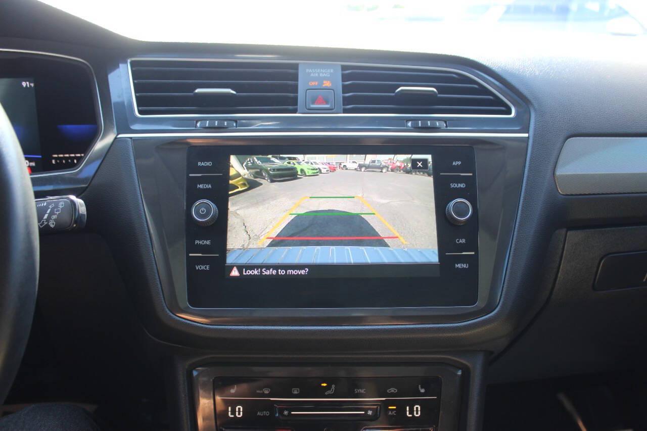 2022 Gray Volkswagen Tiguan SE (3VV3B7AX8NM) with an 2.0L Turbo I4 184hp 221ft. lbs. 2.0L I4 engine, Automatic 8-Speed transmission, located at 4301 NW 39th , Oklahoma City, OK, 73112, (405) 949-5600, 35.512135, -97.598671 - Hablamos espanol. SPEND SMART --- BUY FROM SUPER SPORTS. ALL PRICES, DOWN PAYMENTS, PAYMENTS, AND FINANCE TERMS ARE NEGOTIABLE AT THE TIME OF APPROVAL. WE WILL WORK WITH YOU TO FIT YOUR BUDGET. WE WILL EVEN LOWER AND ADJUST THE NUMBERS TO HELP MAKE THE VEHICLE MORE AFFORDABLE FOR YOU.- Photo#22