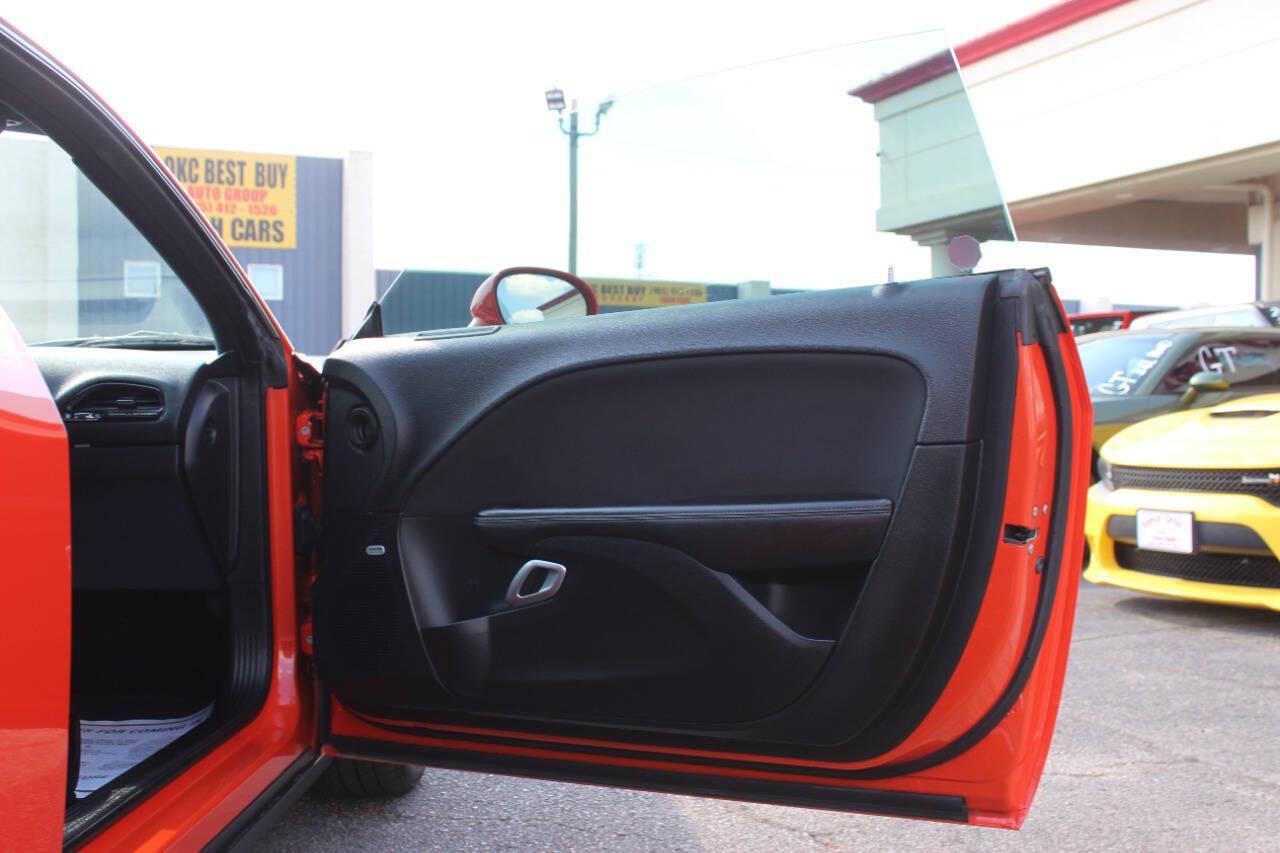 2018 Orange Dodge Challenger R/T Plus (2C3CDZBT5JH) with an 5.7L V8 5.7L V8 engine, Manual 6-Speed transmission, located at 4301 NW 39th , Oklahoma City, OK, 73112, (405) 949-5600, 35.512135, -97.598671 - Hablamos espanol. SPEND SMART --- BUY FROM SUPER SPORTS. ALL PRICES, DOWN PAYMENTS, PAYMENTS, AND FINANCE TERMS ARE NEGOTIABLE AT THE TIME OF APPROVAL. WE WILL WORK WITH YOU TO FIT YOUR BUDGET. WE WILL EVEN LOWER AND ADJUST THE NUMBERS TO HELP MAKE THE VE HICLE MORE AFFORDABLE FOR YOU.- Photo#9