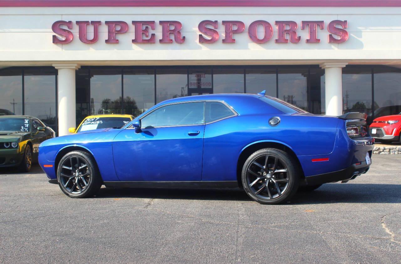 2022 Blue Dodge Challenger SXT (2C3CDZAG7NH) with an Pentastar 3.6L V6 303hp 268ft. lbs. 3.6L V6 engine, Automatic 8-Speed transmission, located at 4301 NW 39th , Oklahoma City, OK, 73112, (405) 949-5600, 35.512135, -97.598671 - Hablamos espanol. SPEND SMART --- BUY FROM SUPER SPORTS. ALL PRICES, DOWN PAYMENTS, PAYMENTS, AND FINANCE TERMS ARE NEGOTIABLE AT THE TIME OF APPROVAL. WE WILL WORK WITH YOU TO FIT YOUR BUDGET. WE WILL EVEN LOWER AND ADJUST THE NUMBERS TO HELP MAKE THE VE HICLE MORE AFFORDABLE FOR YOU.- Photo#3