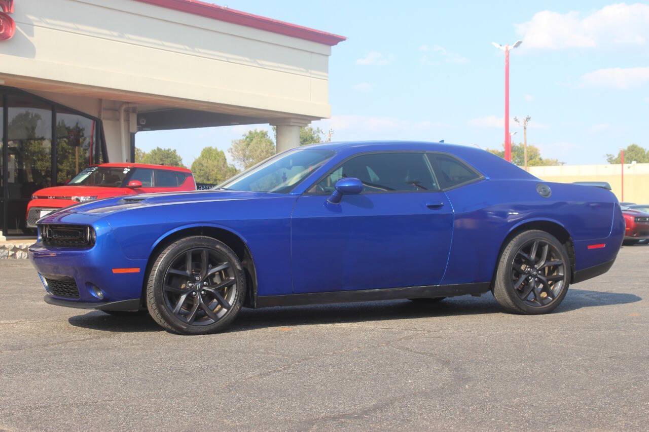 2022 Blue Dodge Challenger SXT (2C3CDZAG7NH) with an Pentastar 3.6L V6 303hp 268ft. lbs. 3.6L V6 engine, Automatic 8-Speed transmission, located at 4301 NW 39th , Oklahoma City, OK, 73112, (405) 949-5600, 35.512135, -97.598671 - Hablamos espanol. SPEND SMART --- BUY FROM SUPER SPORTS. ALL PRICES, DOWN PAYMENTS, PAYMENTS, AND FINANCE TERMS ARE NEGOTIABLE AT THE TIME OF APPROVAL. WE WILL WORK WITH YOU TO FIT YOUR BUDGET. WE WILL EVEN LOWER AND ADJUST THE NUMBERS TO HELP MAKE THE VE HICLE MORE AFFORDABLE FOR YOU.- Photo#4
