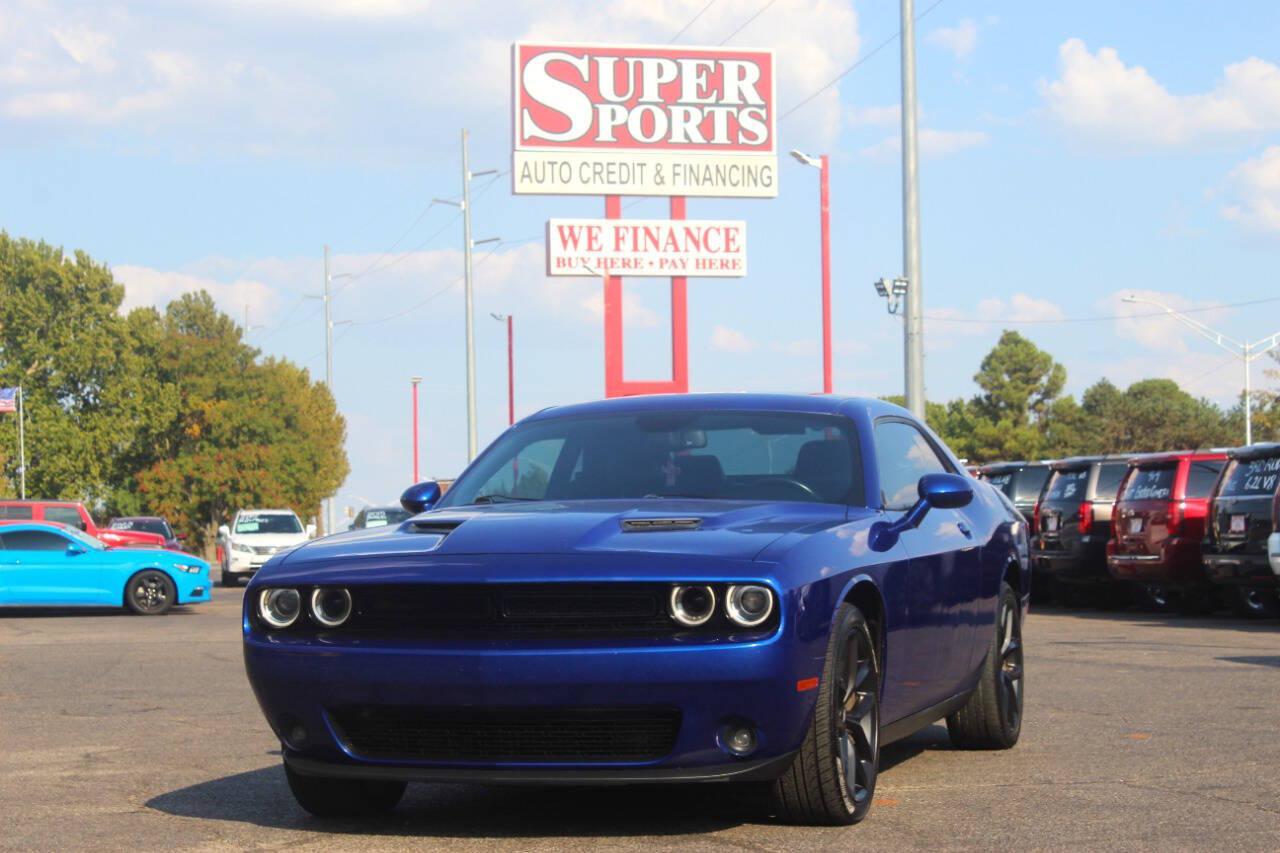 2022 Blue Dodge Challenger SXT (2C3CDZAG7NH) with an Pentastar 3.6L V6 303hp 268ft. lbs. 3.6L V6 engine, Automatic 8-Speed transmission, located at 4301 NW 39th , Oklahoma City, OK, 73112, (405) 949-5600, 35.512135, -97.598671 - Hablamos espanol. SPEND SMART --- BUY FROM SUPER SPORTS. ALL PRICES, DOWN PAYMENTS, PAYMENTS, AND FINANCE TERMS ARE NEGOTIABLE AT THE TIME OF APPROVAL. WE WILL WORK WITH YOU TO FIT YOUR BUDGET. WE WILL EVEN LOWER AND ADJUST THE NUMBERS TO HELP MAKE THE VE HICLE MORE AFFORDABLE FOR YOU.- Photo#5