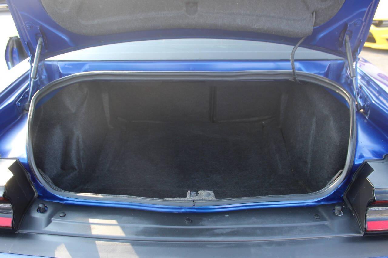 2022 Blue Dodge Challenger SXT (2C3CDZAG7NH) with an Pentastar 3.6L V6 303hp 268ft. lbs. 3.6L V6 engine, Automatic 8-Speed transmission, located at 4301 NW 39th , Oklahoma City, OK, 73112, (405) 949-5600, 35.512135, -97.598671 - Hablamos espanol. SPEND SMART --- BUY FROM SUPER SPORTS. ALL PRICES, DOWN PAYMENTS, PAYMENTS, AND FINANCE TERMS ARE NEGOTIABLE AT THE TIME OF APPROVAL. WE WILL WORK WITH YOU TO FIT YOUR BUDGET. WE WILL EVEN LOWER AND ADJUST THE NUMBERS TO HELP MAKE THE VE HICLE MORE AFFORDABLE FOR YOU.- Photo#12