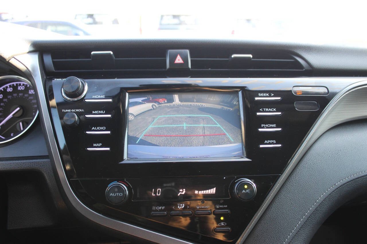 2019 White Toyota Camry LE (4T1B11HK2KU) with an 2.5L I4 203hp 184ft. lbs. 2.5L I4 engine, Automatic 8-Speed transmission, located at 4301 NW 39th , Oklahoma City, OK, 73112, (405) 949-5600, 35.512135, -97.598671 - Hablamos espanol. SPEND SMART --- BUY FROM SUPER SPORTS. ALL PRICES, DOWN PAYMENTS, PAYMENTS, AND FINANCE TERMS ARE NEGOTIABLE AT THE TIME OF APPROVAL. WE WILL WORK WITH YOU TO FIT YOUR BUDGET. WE WILL EVEN LOWER AND ADJUST THE NUMBERS TO HELP MAKE THE VEHICLE MORE AFFORDABLE FOR YOU.- Photo#7