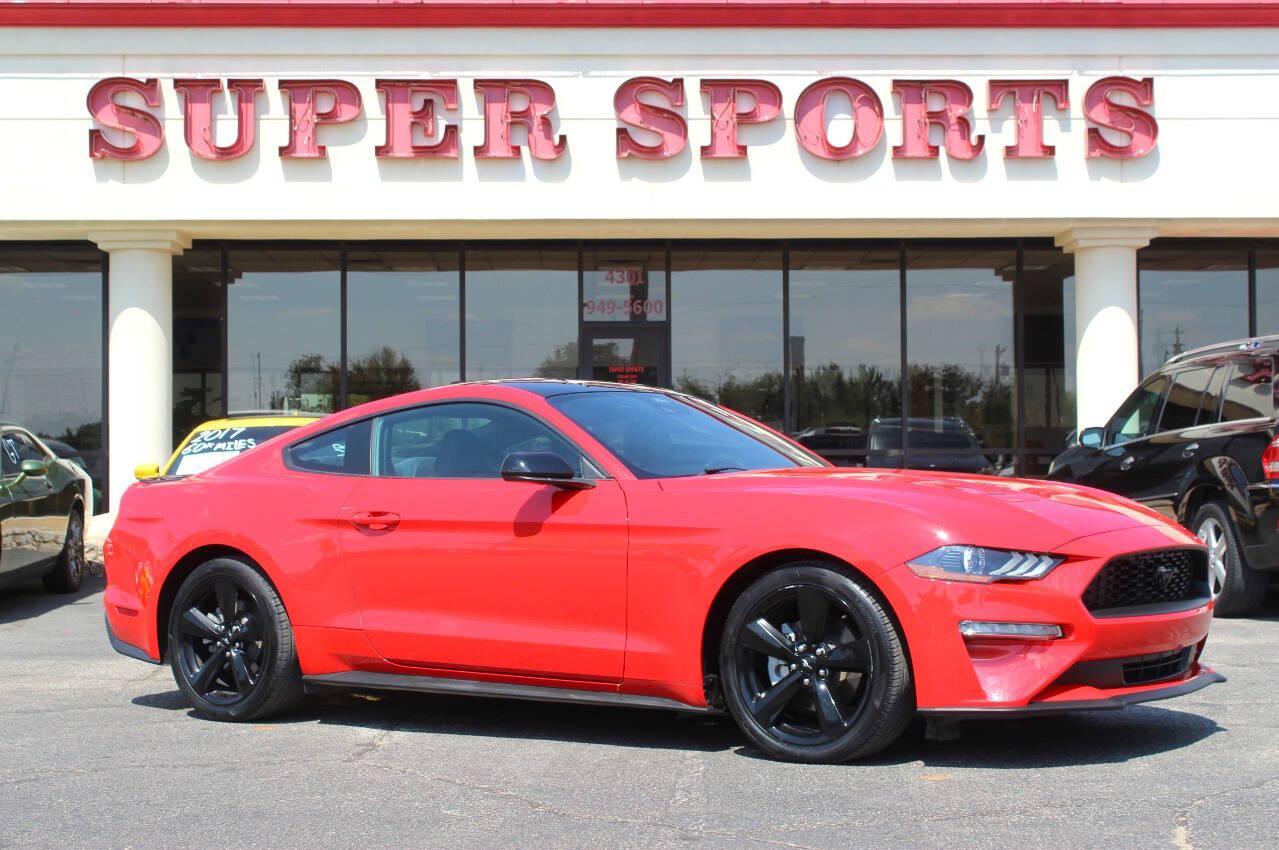 2021 Red Ford Mustang EcoBoost Coupe (1FA6P8TH2M5) with an 2.3L I4 Turbocharger 2.3L I4 engine, Automatic 10-Speed transmission, located at 4301 NW 39th , Oklahoma City, OK, 73112, (405) 949-5600, 35.512135, -97.598671 - Hablamos espanol. SPEND SMART --- BUY FROM SUPER SPORTS. ALL PRICES, DOWN PAYMENTS, PAYMENTS, AND FINANCE TERMS ARE NEGOTIABLE AT THE TIME OF APPROVAL. WE WILL WORK WITH YOU TO FIT YOUR BUDGET. WE WILL EVEN LOWER AND ADJUST THE NUMBERS TO HELP MAKE THE VEHICLE MORE AFFORDABLE FOR YOU.- Photo#0