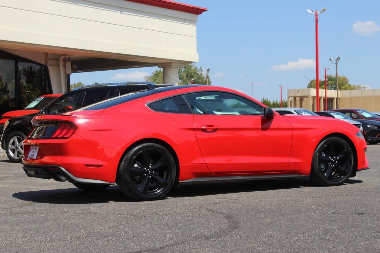 2021 Red Ford Mustang EcoBoost Coupe (1FA6P8TH2M5) with an 2.3L I4 Turbocharger 2.3L I4 engine, Automatic 10-Speed transmission, located at 4301 NW 39th , Oklahoma City, OK, 73112, (405) 949-5600, 35.512135, -97.598671 - Hablamos espanol. SPEND SMART --- BUY FROM SUPER SPORTS. ALL PRICES, DOWN PAYMENTS, PAYMENTS, AND FINANCE TERMS ARE NEGOTIABLE AT THE TIME OF APPROVAL. WE WILL WORK WITH YOU TO FIT YOUR BUDGET. WE WILL EVEN LOWER AND ADJUST THE NUMBERS TO HELP MAKE THE VEHICLE MORE AFFORDABLE FOR YOU.- Photo#2