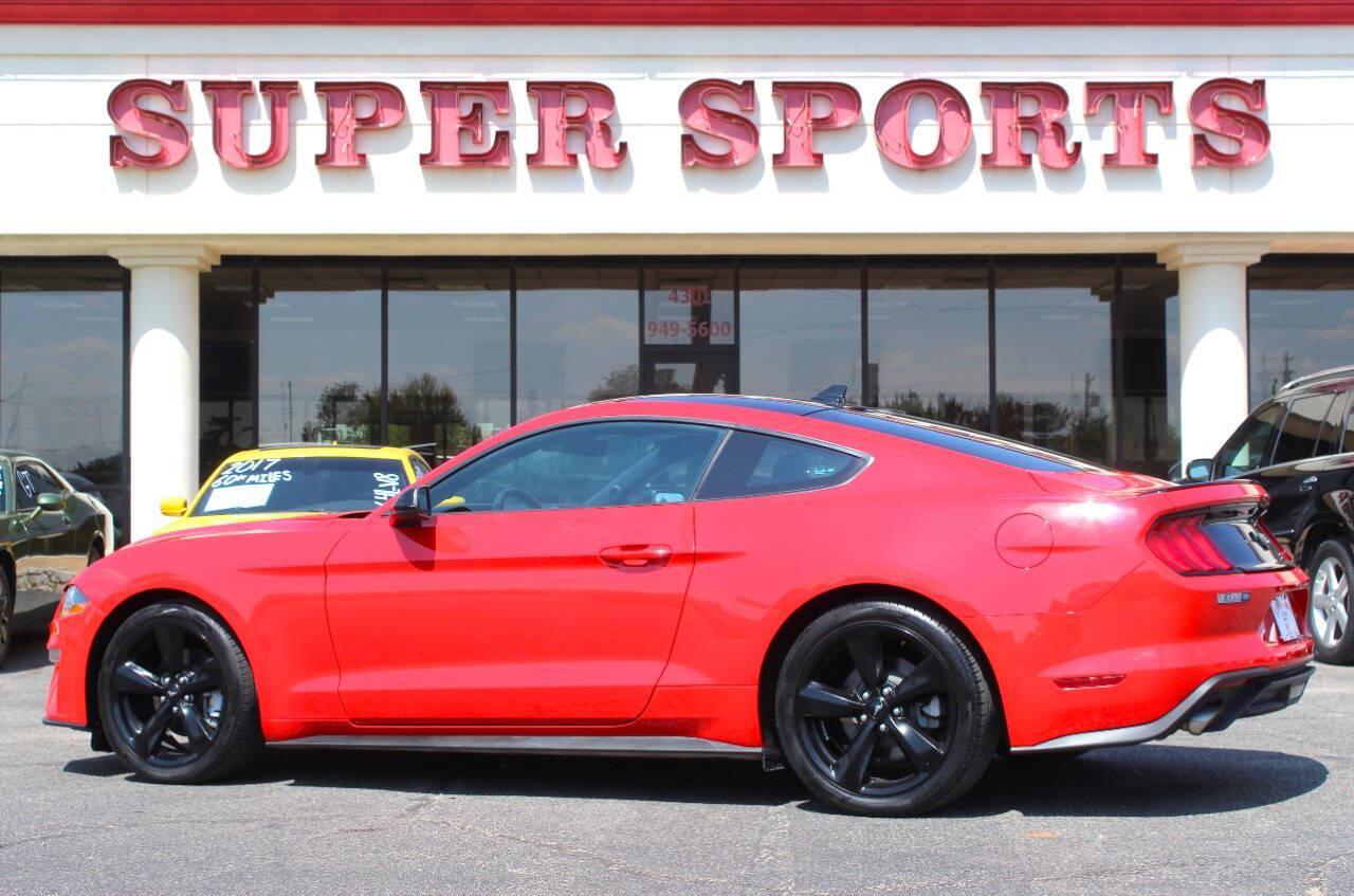 2021 Red Ford Mustang EcoBoost Coupe (1FA6P8TH2M5) with an 2.3L I4 Turbocharger 2.3L I4 engine, Automatic 10-Speed transmission, located at 4301 NW 39th , Oklahoma City, OK, 73112, (405) 949-5600, 35.512135, -97.598671 - Hablamos espanol. SPEND SMART --- BUY FROM SUPER SPORTS. ALL PRICES, DOWN PAYMENTS, PAYMENTS, AND FINANCE TERMS ARE NEGOTIABLE AT THE TIME OF APPROVAL. WE WILL WORK WITH YOU TO FIT YOUR BUDGET. WE WILL EVEN LOWER AND ADJUST THE NUMBERS TO HELP MAKE THE VEHICLE MORE AFFORDABLE FOR YOU.- Photo#4