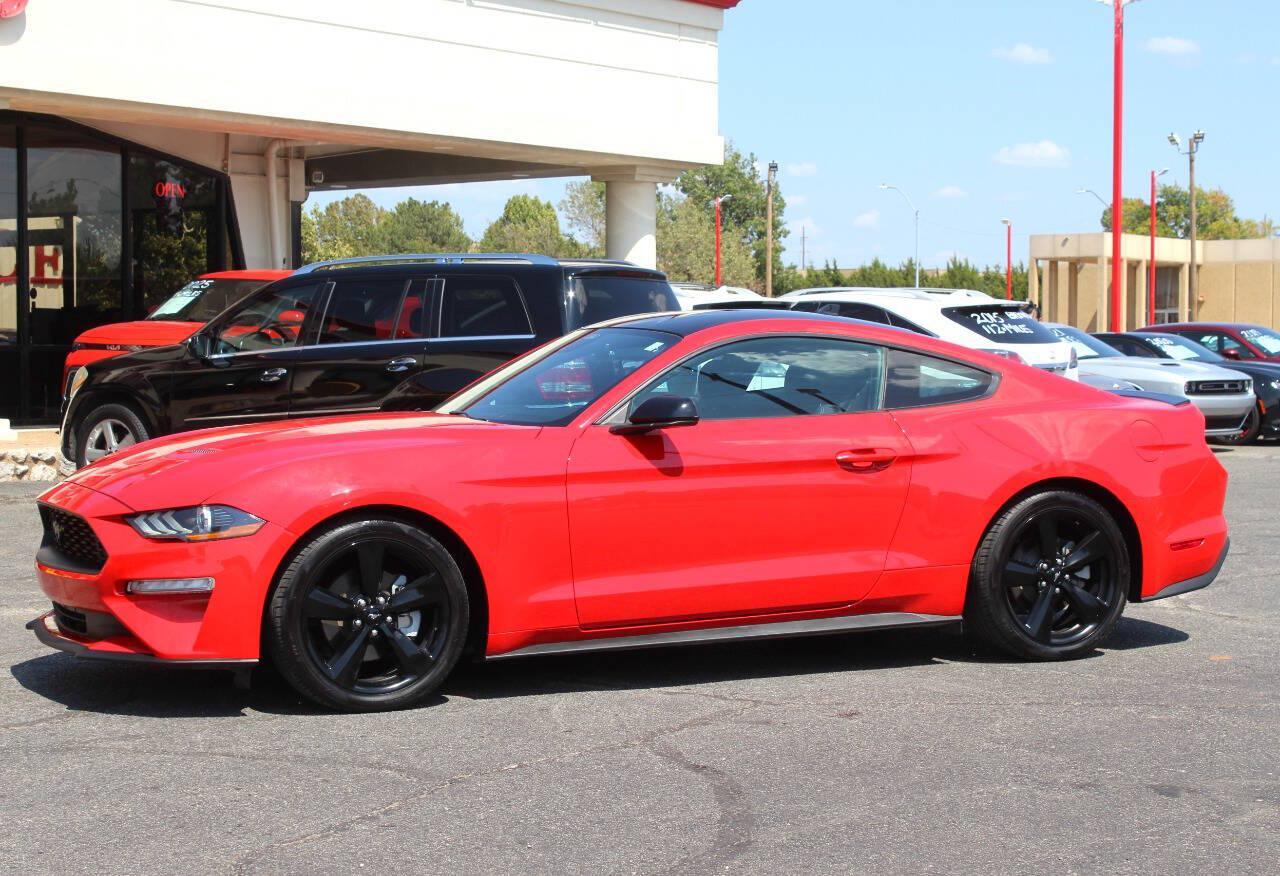 2021 Red Ford Mustang EcoBoost Coupe (1FA6P8TH2M5) with an 2.3L I4 Turbocharger 2.3L I4 engine, Automatic 10-Speed transmission, located at 4301 NW 39th , Oklahoma City, OK, 73112, (405) 949-5600, 35.512135, -97.598671 - Hablamos espanol. SPEND SMART --- BUY FROM SUPER SPORTS. ALL PRICES, DOWN PAYMENTS, PAYMENTS, AND FINANCE TERMS ARE NEGOTIABLE AT THE TIME OF APPROVAL. WE WILL WORK WITH YOU TO FIT YOUR BUDGET. WE WILL EVEN LOWER AND ADJUST THE NUMBERS TO HELP MAKE THE VEHICLE MORE AFFORDABLE FOR YOU.- Photo#5