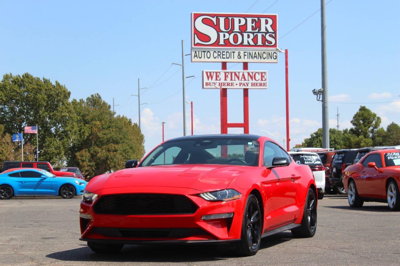 2021 Red Ford Mustang EcoBoost Coupe (1FA6P8TH2M5) with an 2.3L I4 Turbocharger 2.3L I4 engine, Automatic 10-Speed transmission, located at 4301 NW 39th , Oklahoma City, OK, 73112, (405) 949-5600, 35.512135, -97.598671 - Hablamos espanol. SPEND SMART --- BUY FROM SUPER SPORTS. ALL PRICES, DOWN PAYMENTS, PAYMENTS, AND FINANCE TERMS ARE NEGOTIABLE AT THE TIME OF APPROVAL. WE WILL WORK WITH YOU TO FIT YOUR BUDGET. WE WILL EVEN LOWER AND ADJUST THE NUMBERS TO HELP MAKE THE VEHICLE MORE AFFORDABLE FOR YOU.- Photo#6