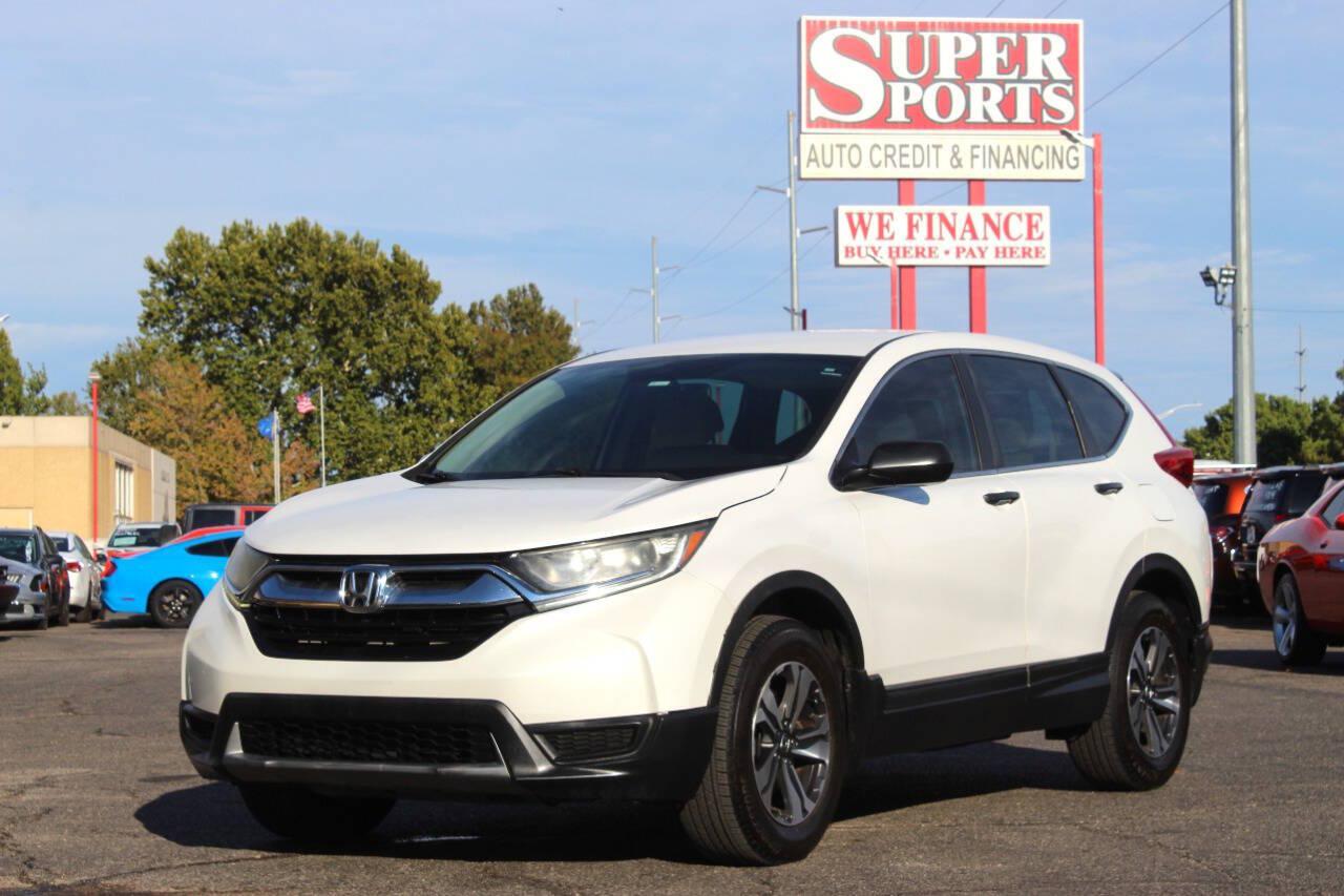 2019 White Honda CR-V LX AWD (5J6RW6H3XKL) with an 2.4L I4 184hp 180ft. lbs. 2.4L I4 engine, CVT transmission, located at 4301 NW 39th , Oklahoma City, OK, 73112, (405) 949-5600, 35.512135, -97.598671 - Hablamos espanol. SPEND SMART --- BUY FROM SUPER SPORTS. ALL PRICES, DOWN PAYMENTS, PAYMENTS, AND FINANCE TERMS ARE NEGOTIABLE AT THE TIME OF APPROVAL. WE WILL WORK WITH YOU TO FIT YOUR BUDGET. WE WILL EVEN LOWER AND ADJUST THE NUMBERS TO HELP MAKE THE VEHICLE MORE AFFORDABLE FOR YOU.- Photo#7