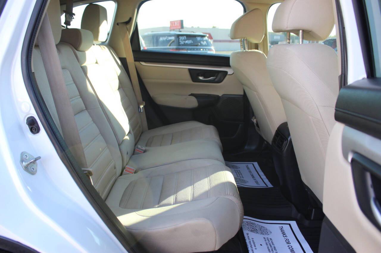 2019 White Honda CR-V LX AWD (5J6RW6H3XKL) with an 2.4L I4 184hp 180ft. lbs. 2.4L I4 engine, CVT transmission, located at 4301 NW 39th , Oklahoma City, OK, 73112, (405) 949-5600, 35.512135, -97.598671 - Hablamos espanol. SPEND SMART --- BUY FROM SUPER SPORTS. ALL PRICES, DOWN PAYMENTS, PAYMENTS, AND FINANCE TERMS ARE NEGOTIABLE AT THE TIME OF APPROVAL. WE WILL WORK WITH YOU TO FIT YOUR BUDGET. WE WILL EVEN LOWER AND ADJUST THE NUMBERS TO HELP MAKE THE VEHICLE MORE AFFORDABLE FOR YOU.- Photo#10