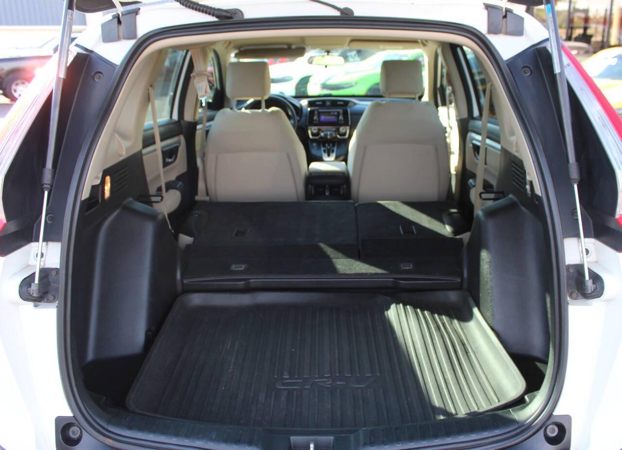 2019 White Honda CR-V LX AWD (5J6RW6H3XKL) with an 2.4L I4 184hp 180ft. lbs. 2.4L I4 engine, CVT transmission, located at 4301 NW 39th , Oklahoma City, OK, 73112, (405) 949-5600, 35.512135, -97.598671 - Hablamos espanol. SPEND SMART --- BUY FROM SUPER SPORTS. ALL PRICES, DOWN PAYMENTS, PAYMENTS, AND FINANCE TERMS ARE NEGOTIABLE AT THE TIME OF APPROVAL. WE WILL WORK WITH YOU TO FIT YOUR BUDGET. WE WILL EVEN LOWER AND ADJUST THE NUMBERS TO HELP MAKE THE VEHICLE MORE AFFORDABLE FOR YOU.- Photo#13