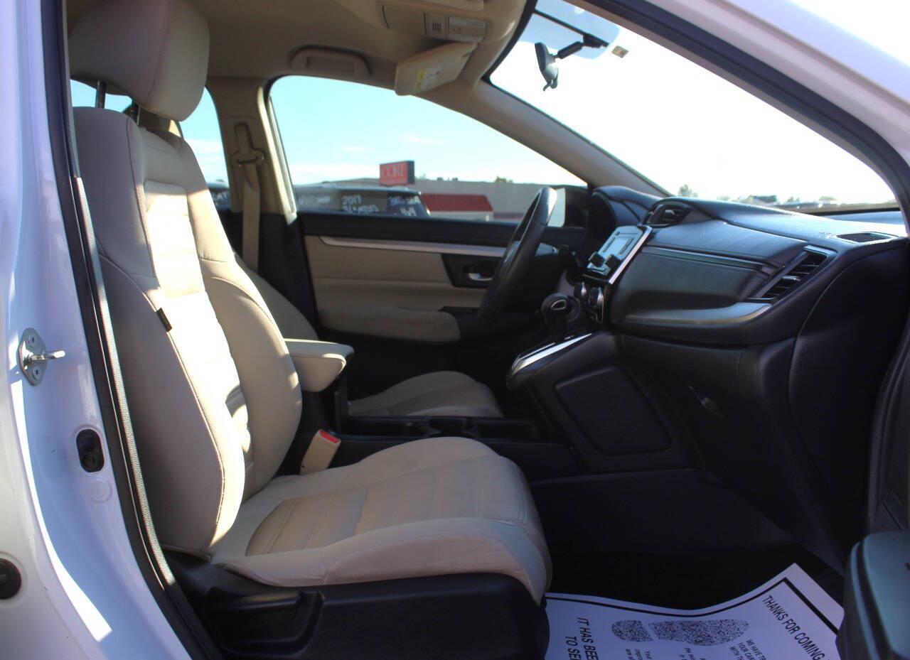 2019 White Honda CR-V LX AWD (5J6RW6H3XKL) with an 2.4L I4 184hp 180ft. lbs. 2.4L I4 engine, CVT transmission, located at 4301 NW 39th , Oklahoma City, OK, 73112, (405) 949-5600, 35.512135, -97.598671 - Hablamos espanol. SPEND SMART --- BUY FROM SUPER SPORTS. ALL PRICES, DOWN PAYMENTS, PAYMENTS, AND FINANCE TERMS ARE NEGOTIABLE AT THE TIME OF APPROVAL. WE WILL WORK WITH YOU TO FIT YOUR BUDGET. WE WILL EVEN LOWER AND ADJUST THE NUMBERS TO HELP MAKE THE VEHICLE MORE AFFORDABLE FOR YOU.- Photo#14