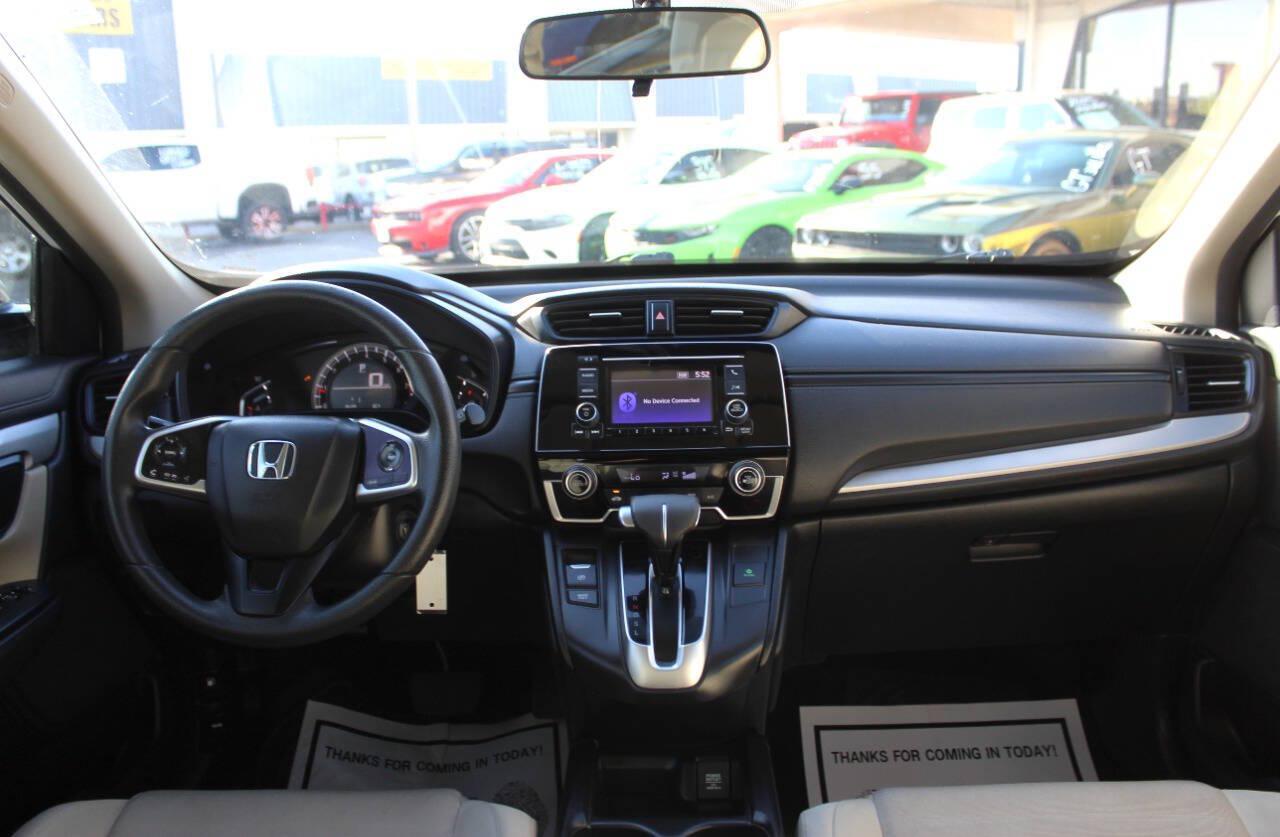 2019 White Honda CR-V LX AWD (5J6RW6H3XKL) with an 2.4L I4 184hp 180ft. lbs. 2.4L I4 engine, CVT transmission, located at 4301 NW 39th , Oklahoma City, OK, 73112, (405) 949-5600, 35.512135, -97.598671 - Hablamos espanol. SPEND SMART --- BUY FROM SUPER SPORTS. ALL PRICES, DOWN PAYMENTS, PAYMENTS, AND FINANCE TERMS ARE NEGOTIABLE AT THE TIME OF APPROVAL. WE WILL WORK WITH YOU TO FIT YOUR BUDGET. WE WILL EVEN LOWER AND ADJUST THE NUMBERS TO HELP MAKE THE VEHICLE MORE AFFORDABLE FOR YOU.- Photo#19