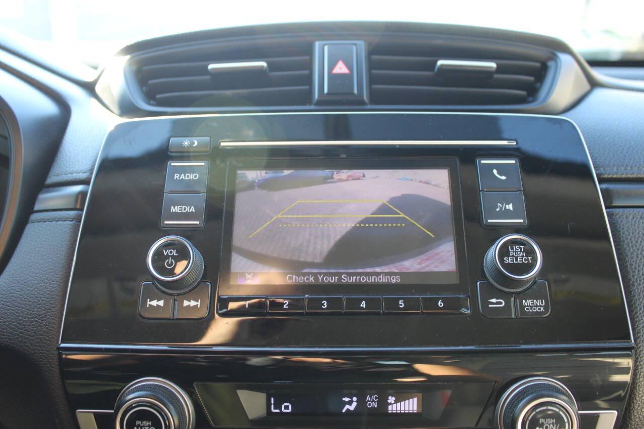 2019 White Honda CR-V LX AWD (5J6RW6H3XKL) with an 2.4L I4 184hp 180ft. lbs. 2.4L I4 engine, CVT transmission, located at 4301 NW 39th , Oklahoma City, OK, 73112, (405) 949-5600, 35.512135, -97.598671 - Hablamos espanol. SPEND SMART --- BUY FROM SUPER SPORTS. ALL PRICES, DOWN PAYMENTS, PAYMENTS, AND FINANCE TERMS ARE NEGOTIABLE AT THE TIME OF APPROVAL. WE WILL WORK WITH YOU TO FIT YOUR BUDGET. WE WILL EVEN LOWER AND ADJUST THE NUMBERS TO HELP MAKE THE VEHICLE MORE AFFORDABLE FOR YOU.- Photo#22
