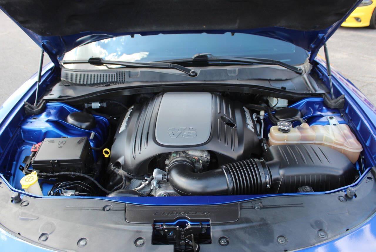 2018 Blue Dodge Charger R/T (2C3CDXCT1JH) with an HEMI 5.7L V8 370hp 395ft. lbs. 5.7L V8 engine, Automatic 8-Speed transmission, located at 4301 NW 39th , Oklahoma City, OK, 73112, (405) 949-5600, 35.512135, -97.598671 - Hablamos espanol. SPEND SMART --- BUY FROM SUPER SPORTS. ALL PRICES, DOWN PAYMENTS, PAYMENTS, AND FINANCE TERMS ARE NEGOTIABLE AT THE TIME OF APPROVAL. WE WILL WORK WITH YOU TO FIT YOUR BUDGET. WE WILL EVEN LOWER AND ADJUST THE NUMBERS TO HELP MAKE THE VEHICLE MORE AFFORDABLE FOR YOU.- Photo#7
