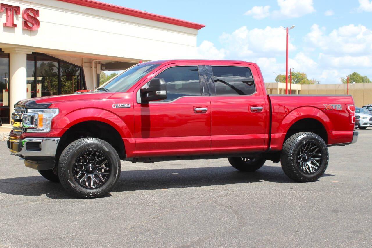 2018 Red Ford F-150 XLT SuperCrew 5.5-ft. Bed 4WD (1FTEW1EG6JF) with an EcoBoost 3.5L Twin Turbo V6 375hp 470ft. lbs. 3.5L V6 engine, Automatic 10-Speed transmission, located at 4301 NW 39th , Oklahoma City, OK, 73112, (405) 949-5600, 35.512135, -97.598671 - Hablamos espanol. SPEND SMART --- BUY FROM SUPER SPORTS. ALL PRICES, DOWN PAYMENTS, PAYMENTS, AND FINANCE TERMS ARE NEGOTIABLE AT THE TIME OF APPROVAL. WE WILL WORK WITH YOU TO FIT YOUR BUDGET. WE WILL EVEN LOWER AND ADJUST THE NUMBERS TO HELP MAKE THE VEHICLE MORE AFFORDABLE FOR YOU.- Photo#5