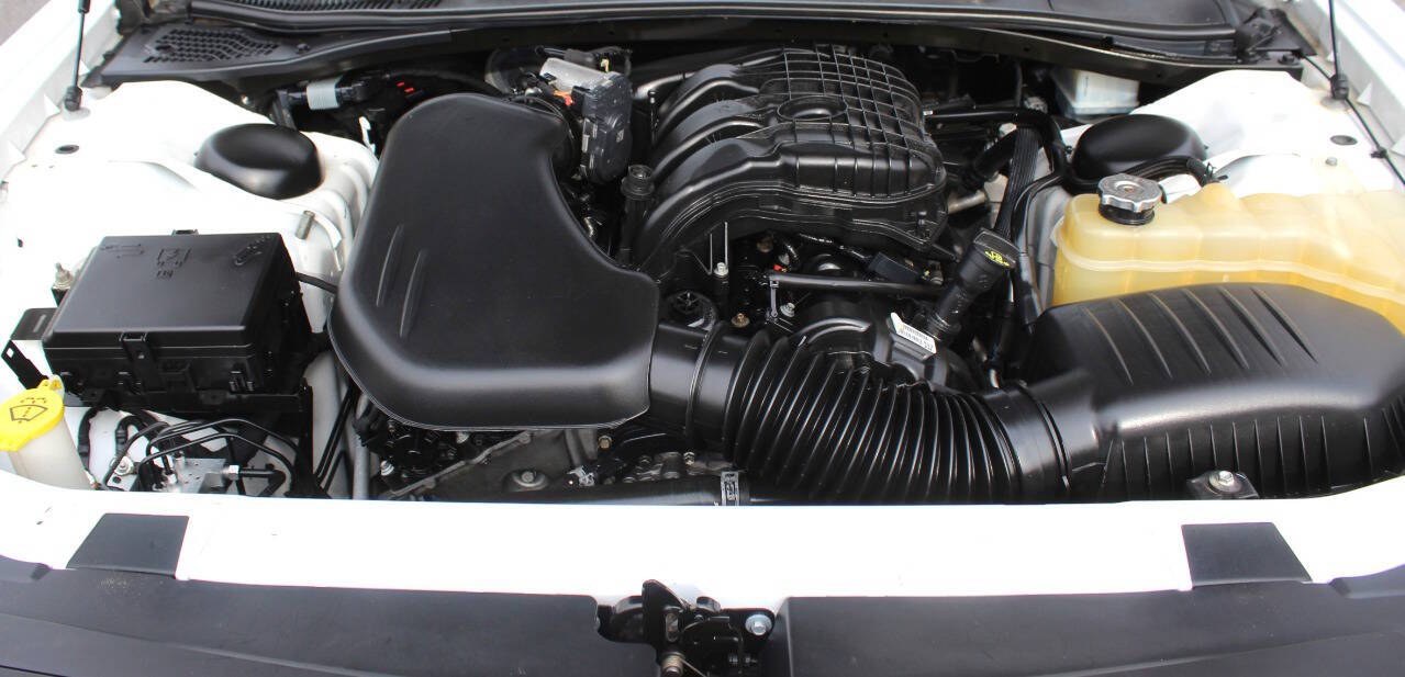 2018 White Dodge Challenger SXT (2C3CDZAGXJH) with an Pentastar 3.6L V6 305hp 268ft. lbs. 3.6L V6 engine, Automatic 8-Speed transmission, located at 4301 NW 39th , Oklahoma City, OK, 73112, (405) 949-5600, 35.512135, -97.598671 - Hablamos espanol. SPEND SMART --- BUY FROM SUPER SPORTS. ALL PRICES, DOWN PAYMENTS, PAYMENTS, AND FINANCE TERMS ARE NEGOTIABLE AT THE TIME OF APPROVAL. WE WILL WORK WITH YOU TO FIT YOUR BUDGET. WE WILL EVEN LOWER AND ADJUST THE NUMBERS TO HELP MAKE THE VEHICLE MORE AFFORDABLE FOR YOU.- Photo#4