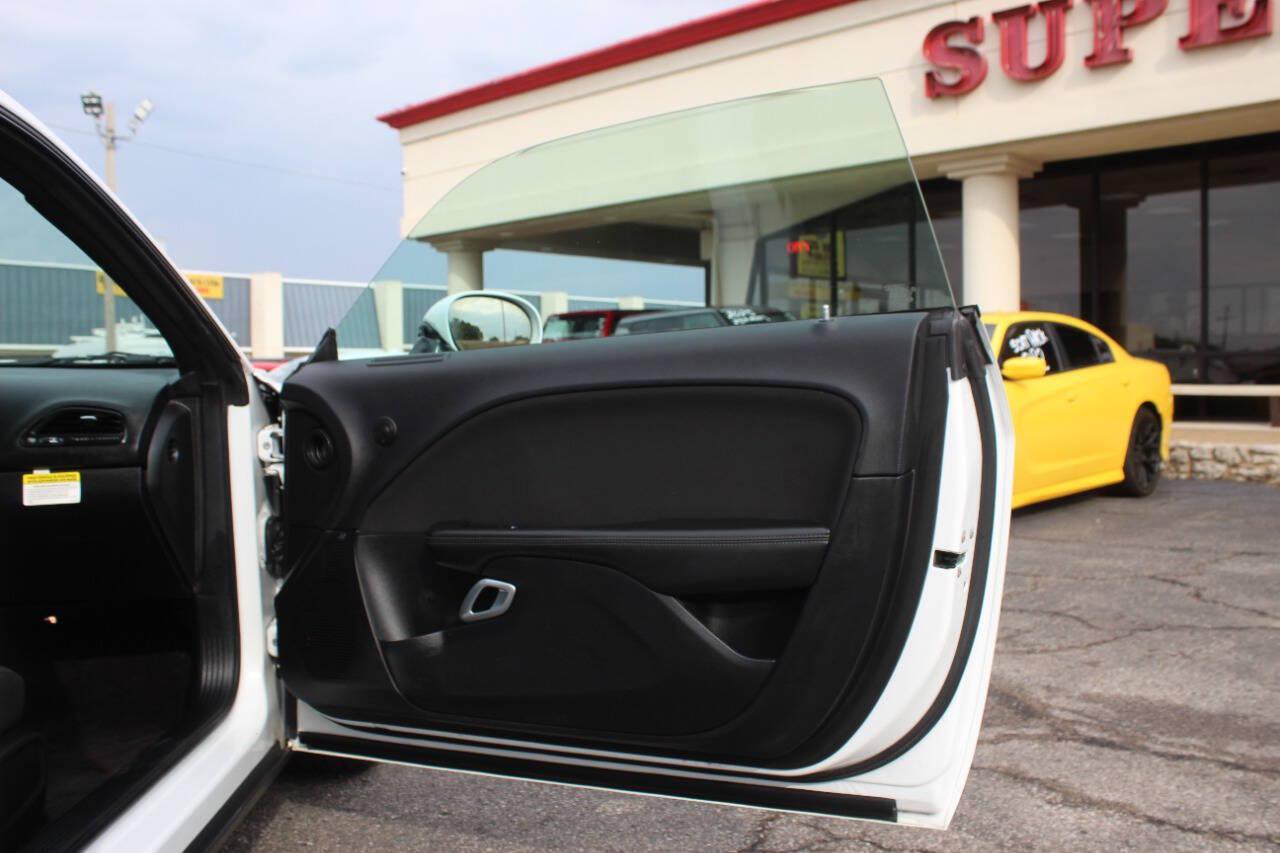 2018 White Dodge Challenger SXT (2C3CDZAGXJH) with an Pentastar 3.6L V6 305hp 268ft. lbs. 3.6L V6 engine, Automatic 8-Speed transmission, located at 4301 NW 39th , Oklahoma City, OK, 73112, (405) 949-5600, 35.512135, -97.598671 - Hablamos espanol. SPEND SMART --- BUY FROM SUPER SPORTS. ALL PRICES, DOWN PAYMENTS, PAYMENTS, AND FINANCE TERMS ARE NEGOTIABLE AT THE TIME OF APPROVAL. WE WILL WORK WITH YOU TO FIT YOUR BUDGET. WE WILL EVEN LOWER AND ADJUST THE NUMBERS TO HELP MAKE THE VEHICLE MORE AFFORDABLE FOR YOU.- Photo#12