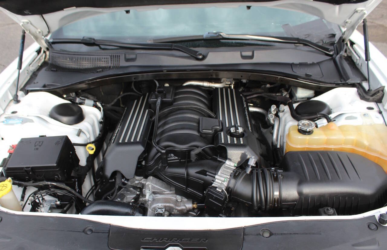 2019 White Dodge Charger R/T 392 (2C3CDXGJ7KH) with an HEMI 6.4L V8 485hp 475ft. lbs. 6.4L V8 engine, Automatic 8-Speed transmission, located at 4301 NW 39th , Oklahoma City, OK, 73112, (405) 949-5600, 35.512135, -97.598671 - Hablamos espanol. SPEND SMART --- BUY FROM SUPER SPORTS. ALL PRICES, DOWN PAYMENTS, PAYMENTS, AND FINANCE TERMS ARE NEGOTIABLE AT THE TIME OF APPROVAL. WE WILL WORK WITH YOU TO FIT YOUR BUDGET. WE WILL EVEN LOWER AND ADJUST THE NUMBERS TO HELP MAKE THE VEHICLE MORE AFFORDABLE FOR YOU.- Photo#4