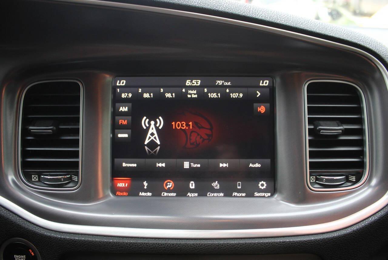 2019 White Dodge Charger R/T 392 (2C3CDXGJ7KH) with an HEMI 6.4L V8 485hp 475ft. lbs. 6.4L V8 engine, Automatic 8-Speed transmission, located at 4301 NW 39th , Oklahoma City, OK, 73112, (405) 949-5600, 35.512135, -97.598671 - Hablamos espanol. SPEND SMART --- BUY FROM SUPER SPORTS. ALL PRICES, DOWN PAYMENTS, PAYMENTS, AND FINANCE TERMS ARE NEGOTIABLE AT THE TIME OF APPROVAL. WE WILL WORK WITH YOU TO FIT YOUR BUDGET. WE WILL EVEN LOWER AND ADJUST THE NUMBERS TO HELP MAKE THE VEHICLE MORE AFFORDABLE FOR YOU.- Photo#19