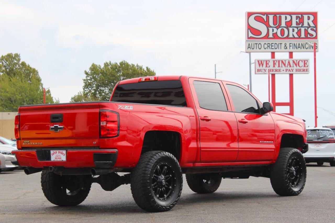 2017 Red Chevrolet Silverado 1500 LT Crew Cab 4WD (3GCUKREC4HG) with an EcoTec3 5.3L V8 355hp 383ft. lbs. 5.3L V8 engine, Automatic 6-Speed transmission, located at 4301 NW 39th , Oklahoma City, OK, 73112, (405) 949-5600, 35.512135, -97.598671 - Hablamos espanol. SPEND SMART --- BUY FROM SUPER SPORTS. ALL PRICES, DOWN PAYMENTS, PAYMENTS, AND FINANCE TERMS ARE NEGOTIABLE AT THE TIME OF APPROVAL. WE WILL WORK WITH YOU TO FIT YOUR BUDGET. WE WILL EVEN LOWER AND ADJUST THE NUMBERS TO HELP MAKE THE VE HICLE MORE AFFORDABLE FOR YOU.- Photo#3